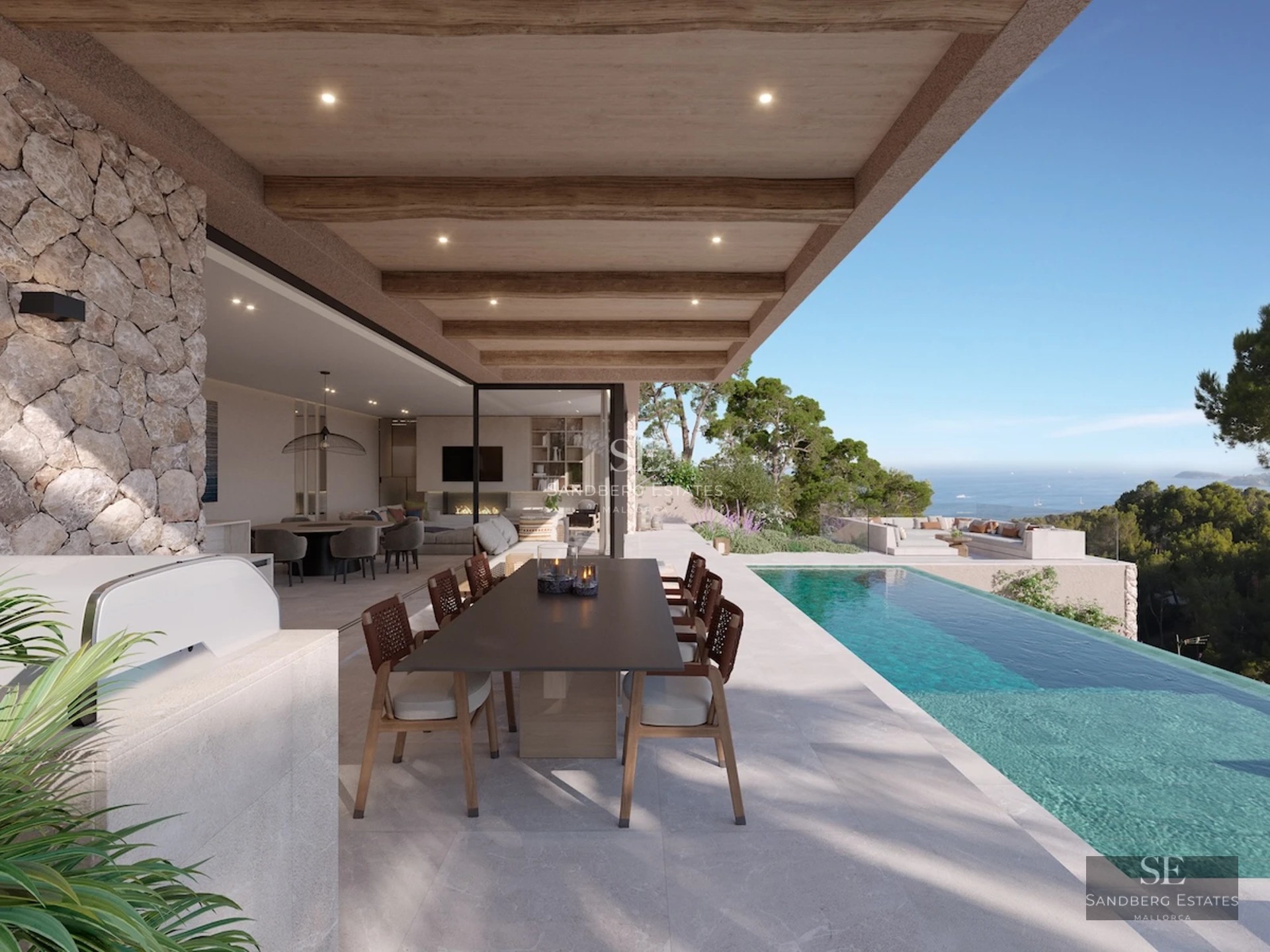 Spacious terrace with pool, sun loungers and sea view. Modern design, high-quality materials and relaxing atmosphere.
