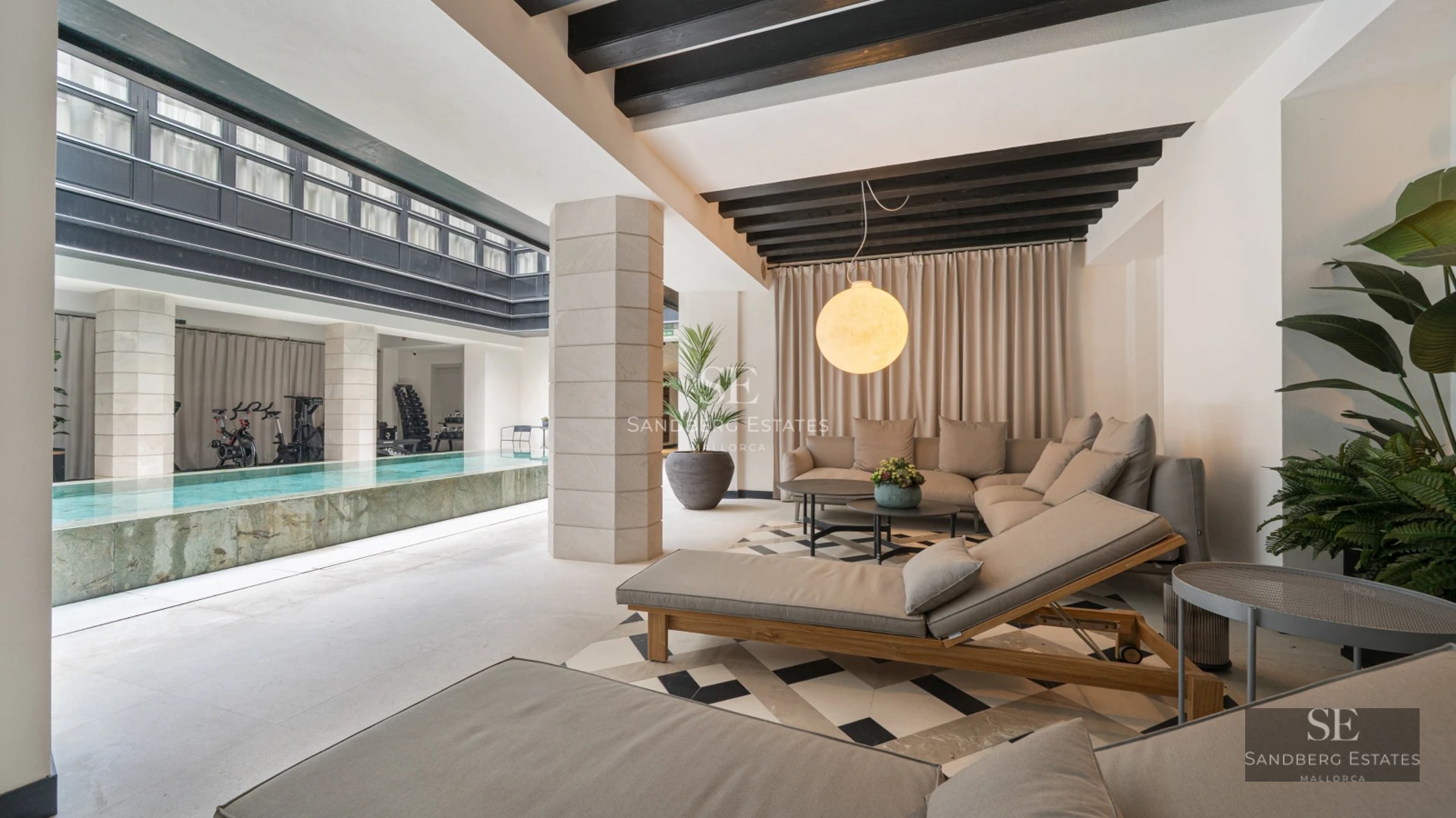 Expansive terrace featuring an infinity pool, ocean views, and modern furniture. Minimalist design with luxury finishes.