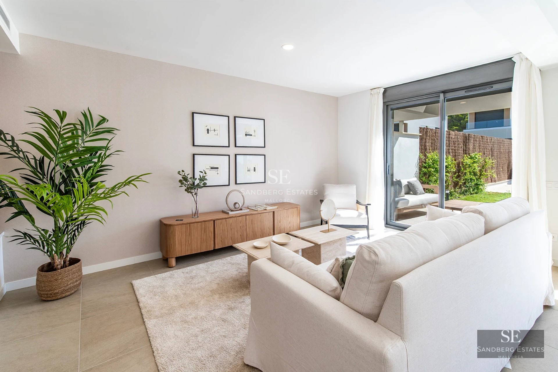 Panoramic view of a modern villa featuring a pool, lush garden, and expansive windows maximizing natural light.