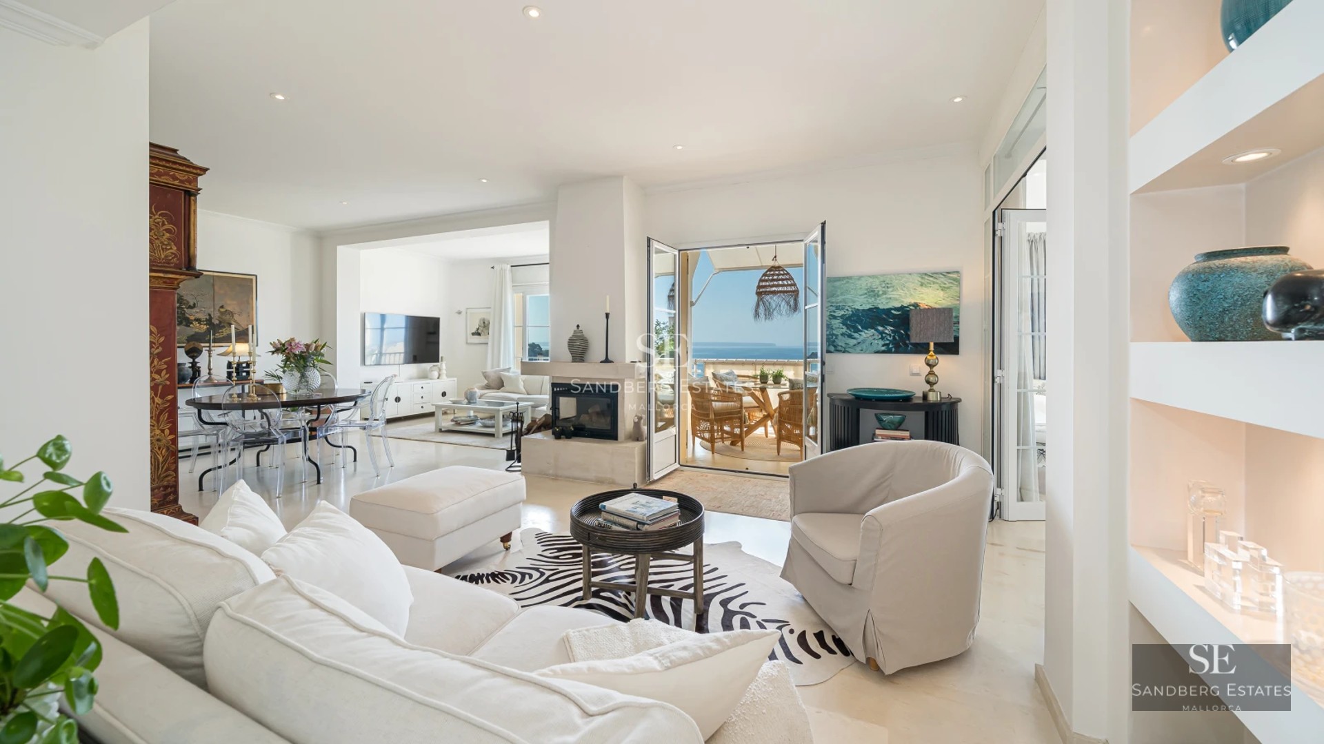 Villa view with infinity pool, manicured lawn, and modern architecture with large windows. Sleek and contemporary design.