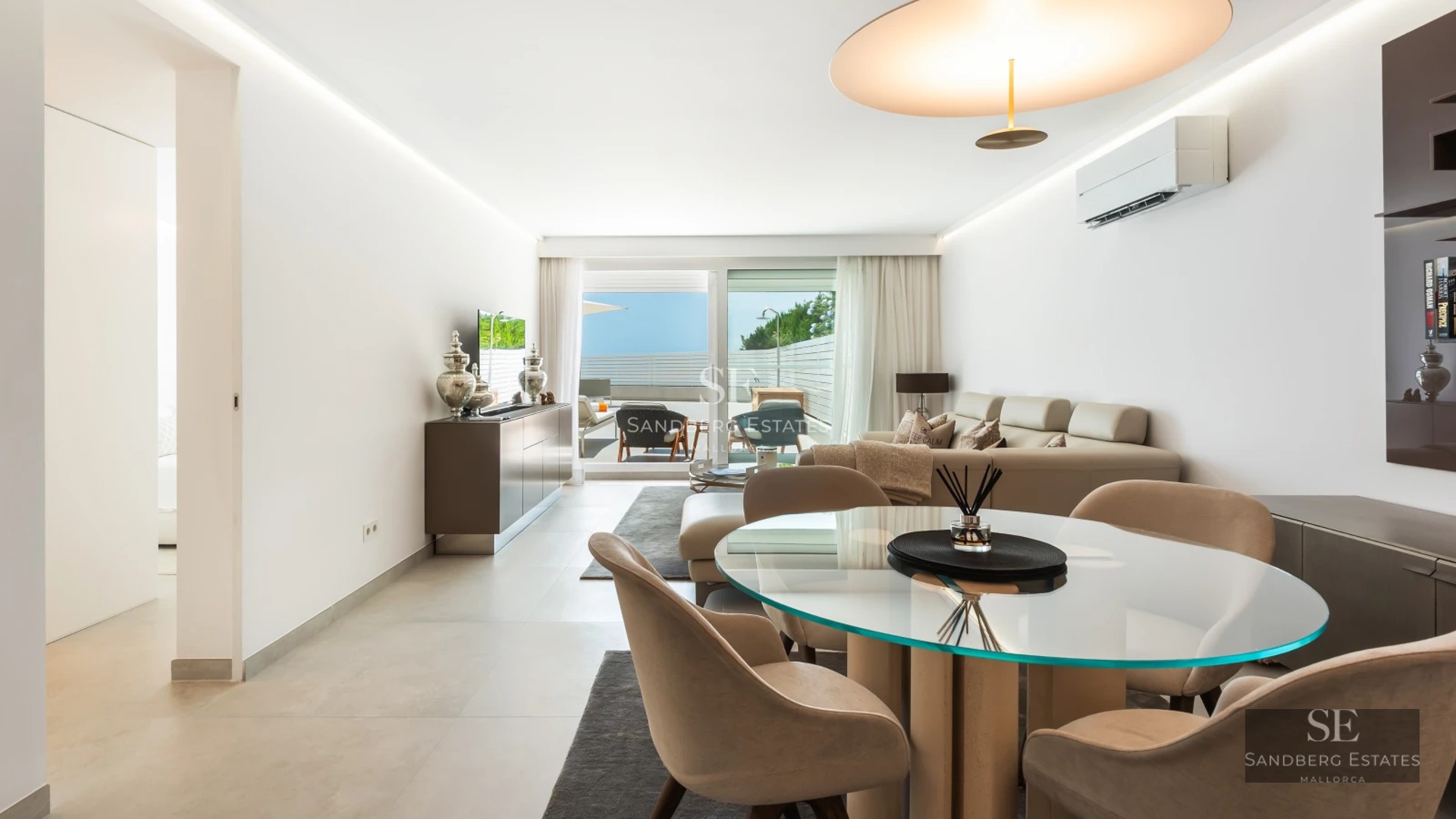 Pool view, lush garden, modern design. Large windows illuminate the property. High-quality materials and finishes throughout.