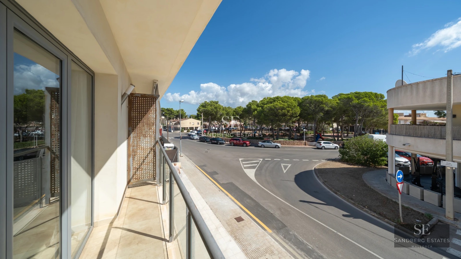 Expansive terrace with infinity pool, ocean views, and modern furniture. Minimalist, elegant design. Ambient lighting.
