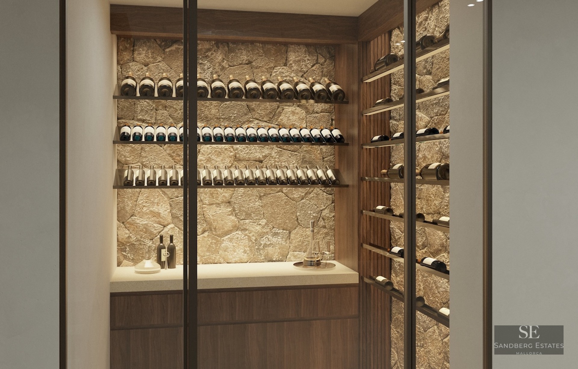 Glass-enclosed wine cellar featuring a natural stone back wall, dark wood shelving, and rows of wine bottles.