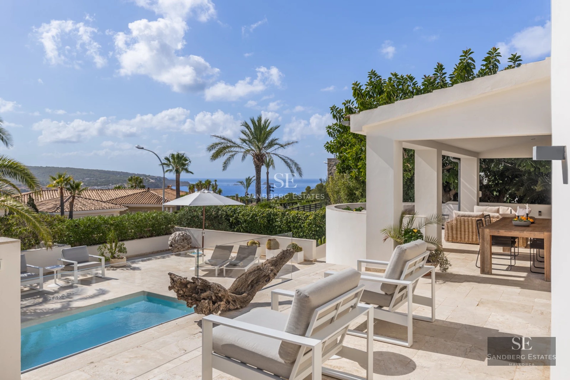 Exterior view of a modern villa with a pool. Minimalist architecture, large windows, terrace, and garden. Contemporary design.