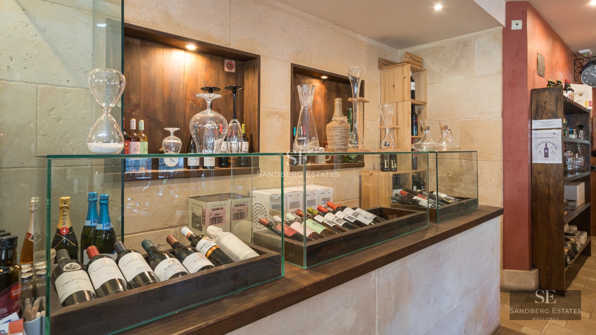 Spacious balcony with panoramic sea views, modern and elegant furniture. Minimalist design with glass railing.