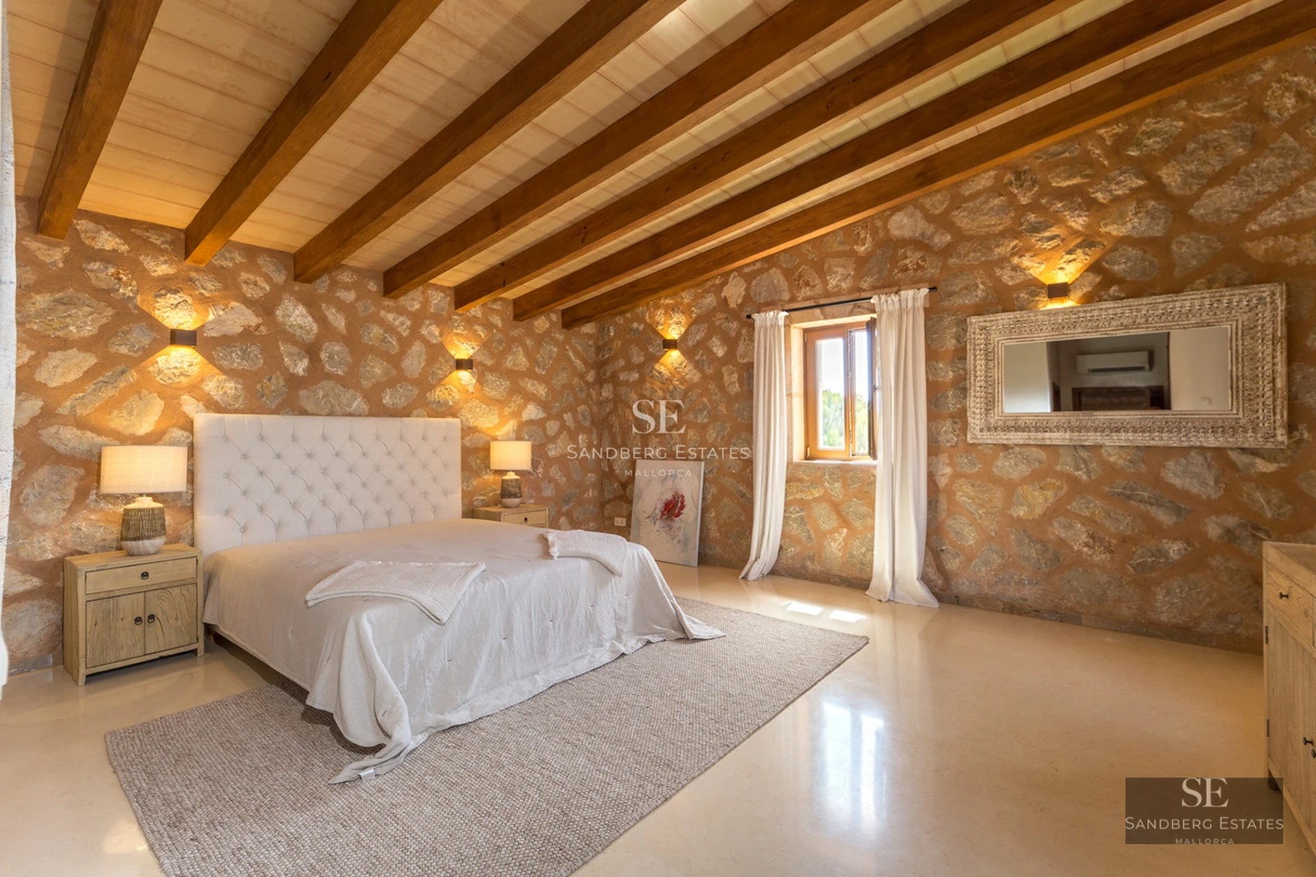 Exterior view of a modern luxury home with an infinity pool, surrounded by lush vegetation and minimalist architectural design.