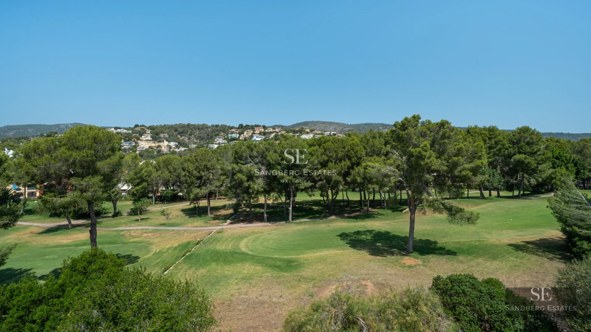 Exterior view of modern villa with infinity pool, lush garden, and expansive terraces. Minimalist, elegant, and bright architecture.