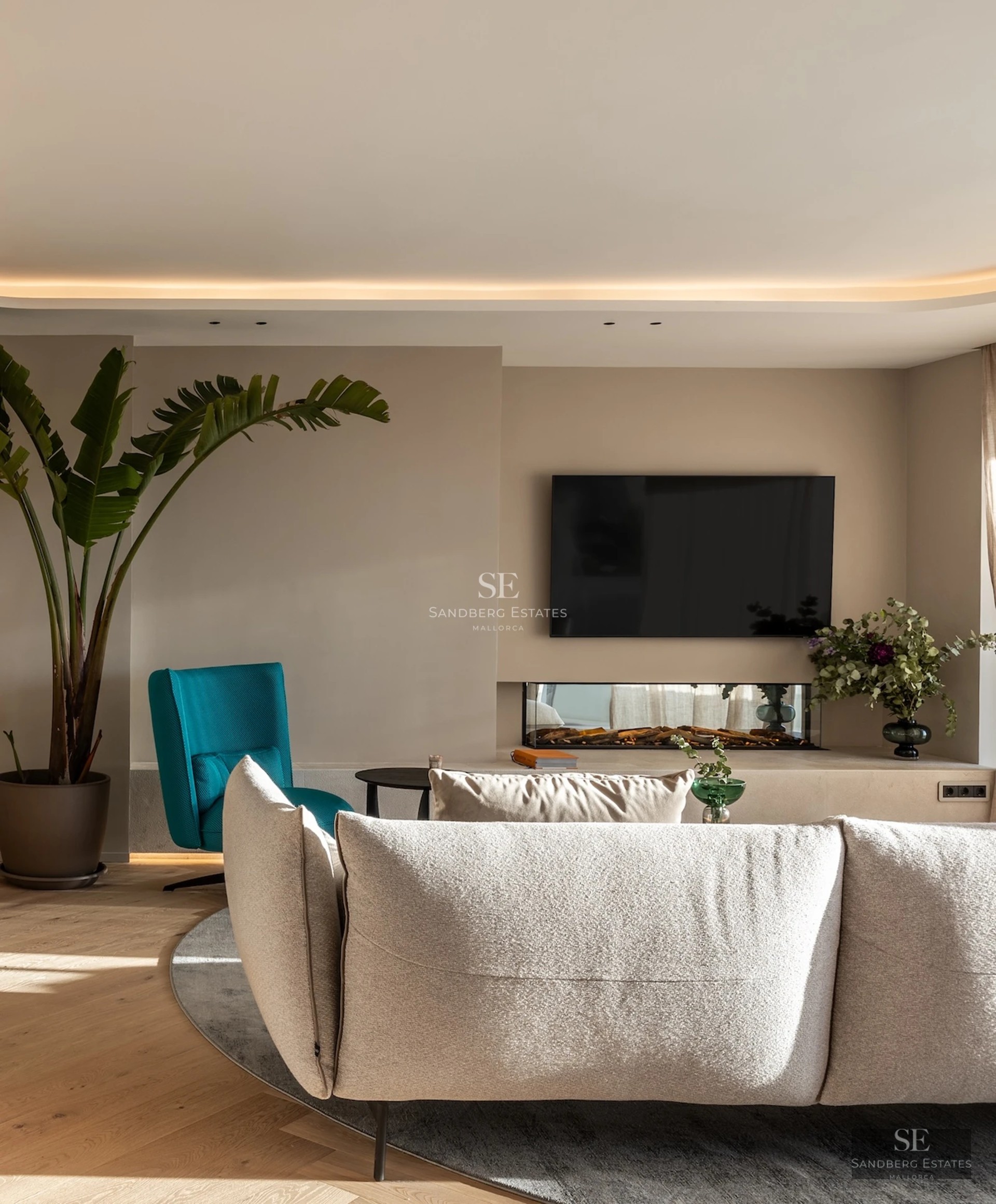 Exterior of a modern villa featuring an infinity pool, spacious terrace, and minimalist architectural design. Lush garden and panoramic views.