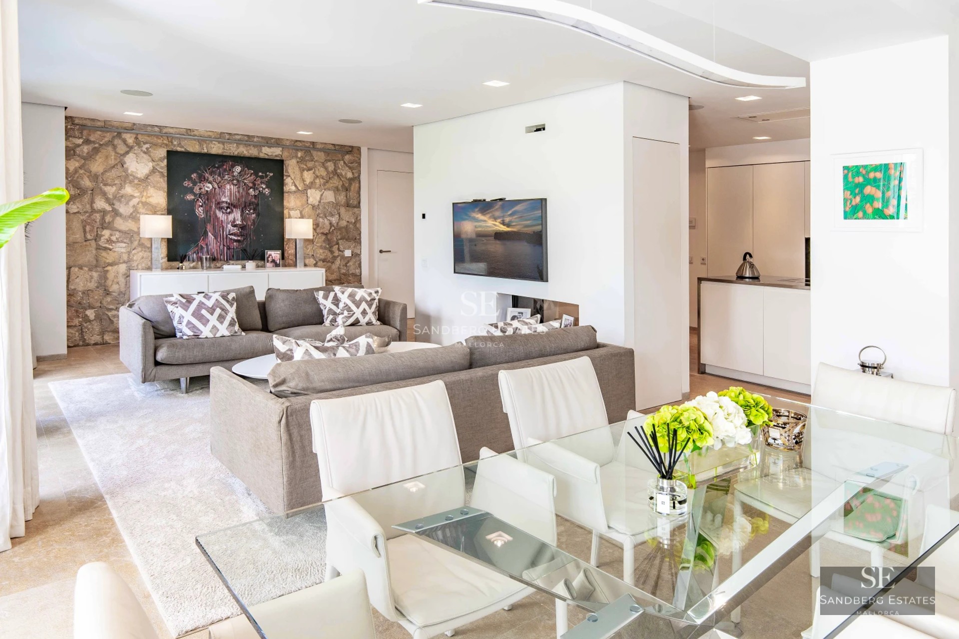 Exterior of a modern villa featuring an infinity pool, spacious terraces, and panoramic views. Minimalist design with high-quality finishes.