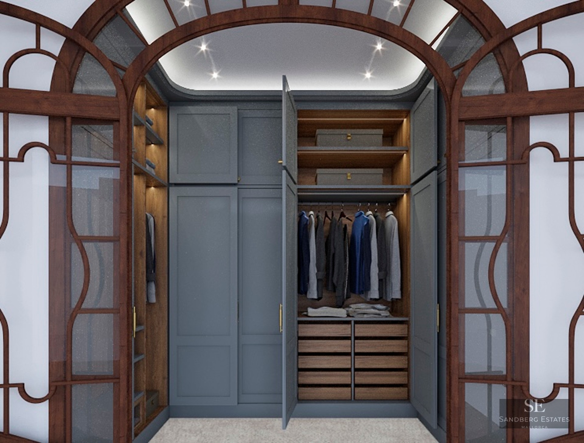 View through arched wooden glass doors into a modern blue-grey wardrobe with integrated lighting.