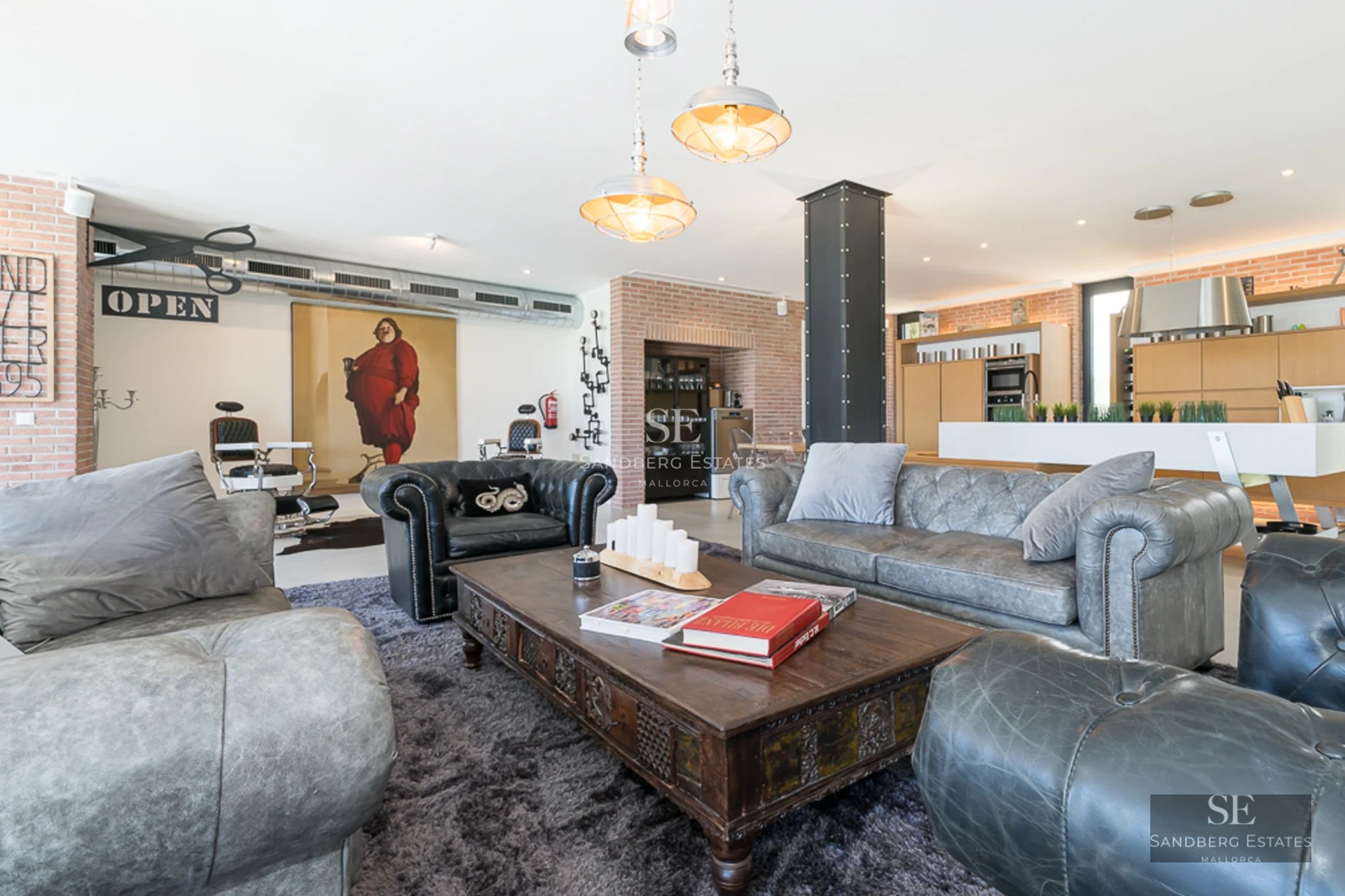 Spacious living room with direct pool access. Modern interior with large windows and natural light. Design details and high-quality finishes.