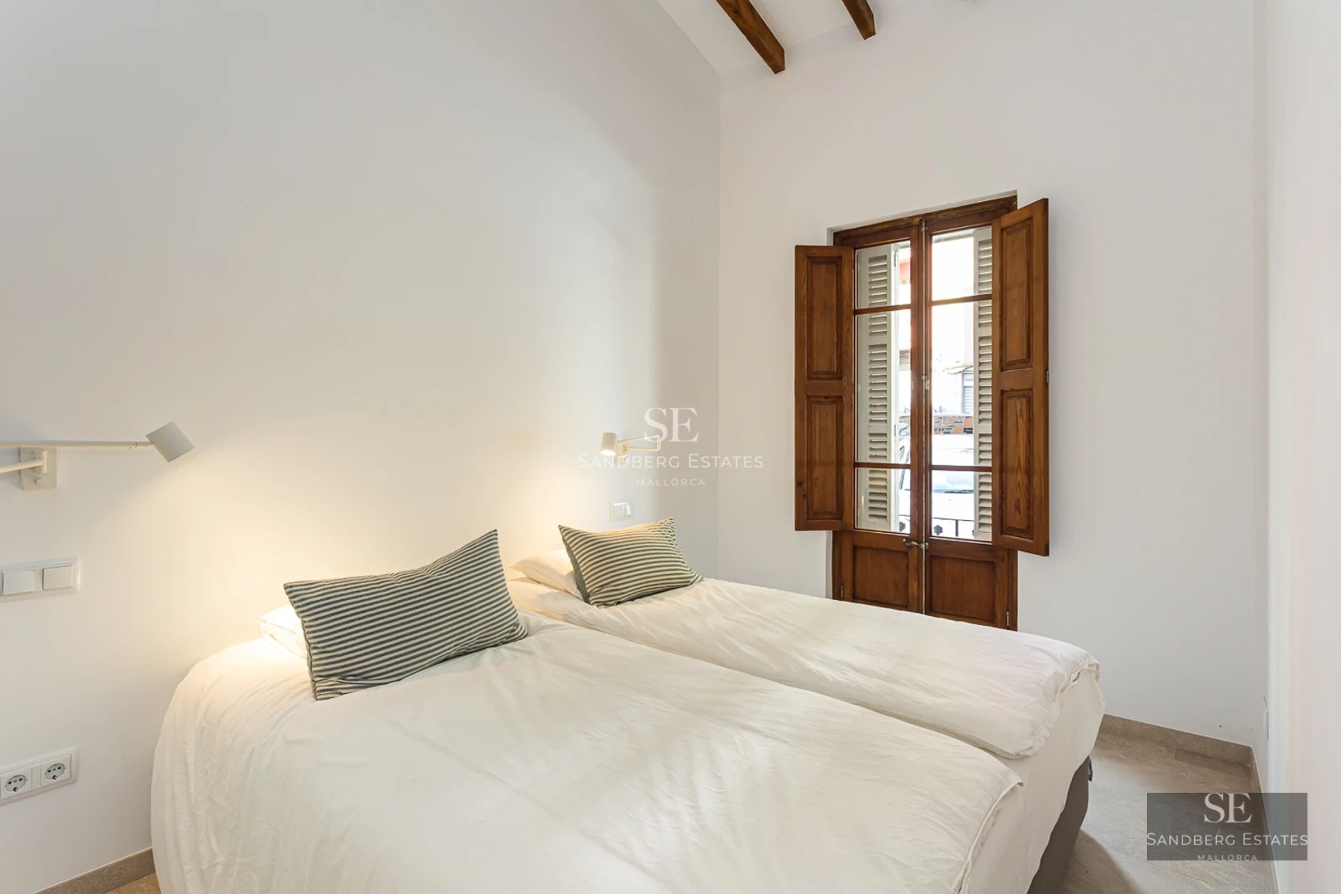 Spacious terrace featuring a pool and modern furniture. Panoramic views. Elegant design with ambient lighting.