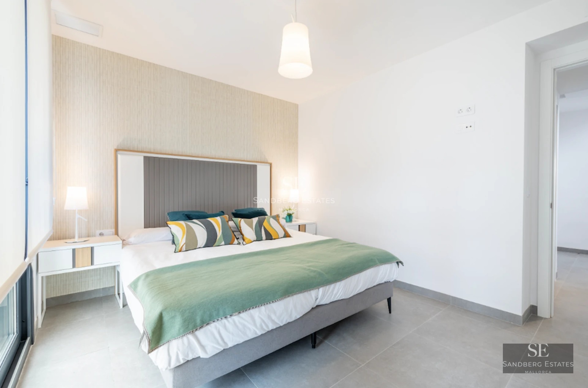 Exterior view of a modern house with swimming pool. Minimalist design, large windows, rectangular pool, and lush garden.