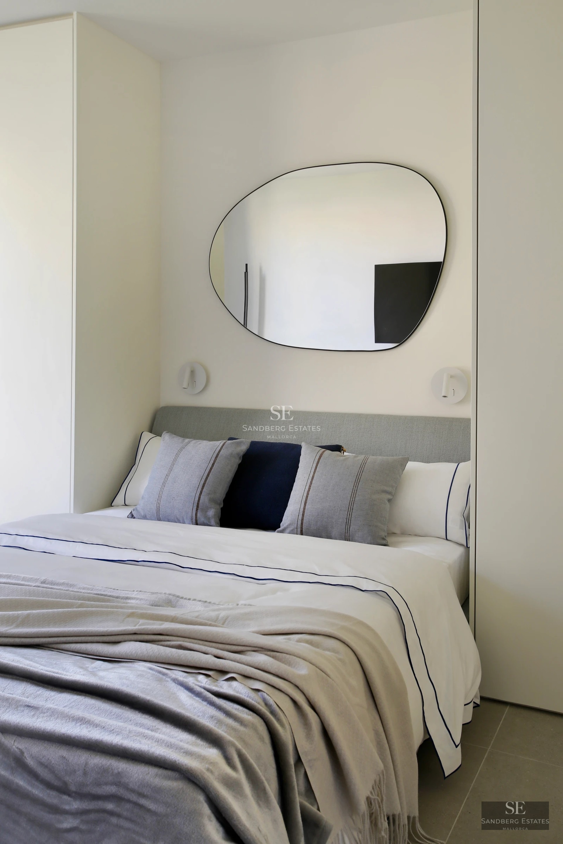 Expansive terrace with infinity pool, sun loungers, and panoramic sea views. Modern architecture with clean lines and abundant natural light.