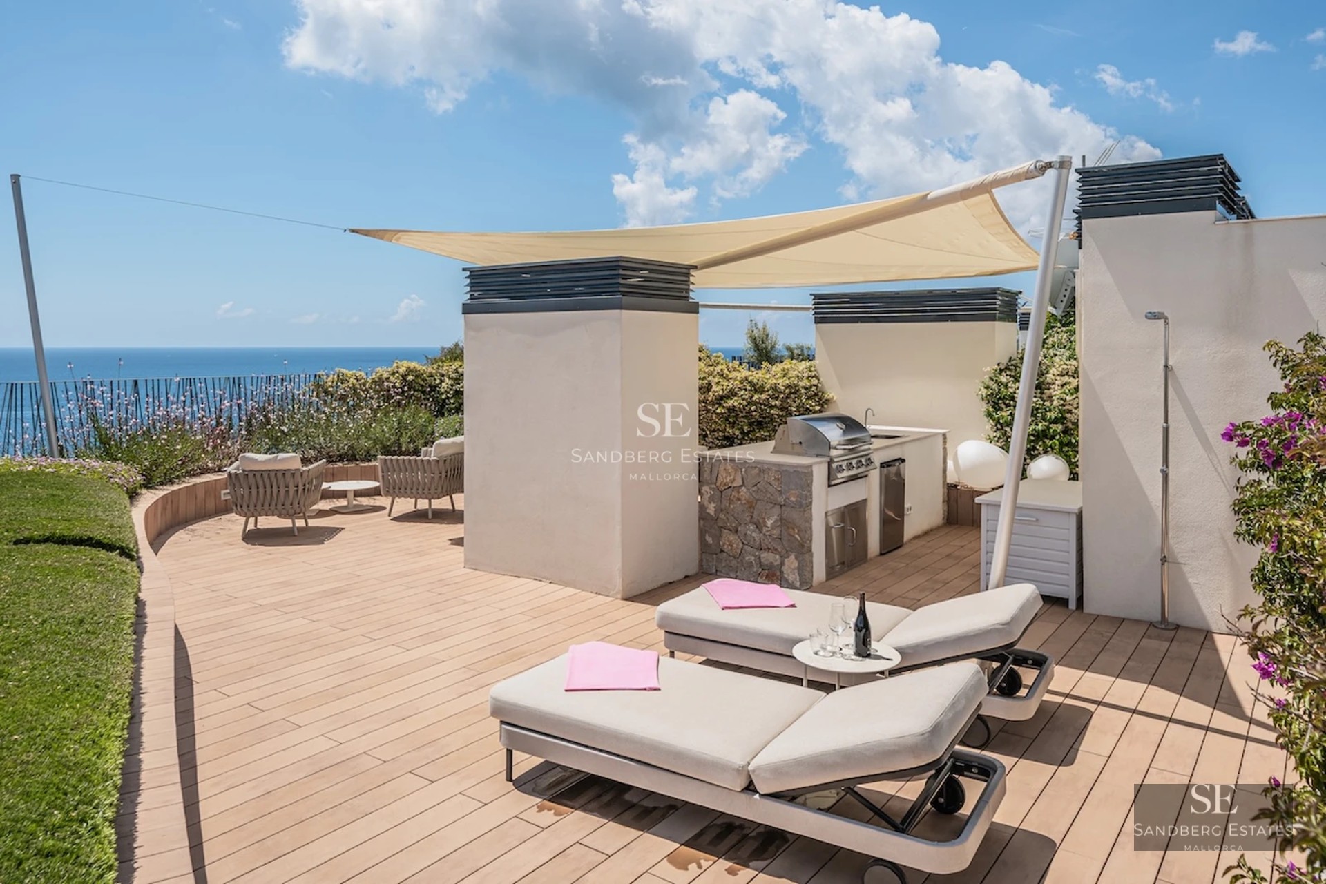 Exterior view of a modern villa with a pool, large garden, and minimalist architecture. Warm lighting highlights the facade.