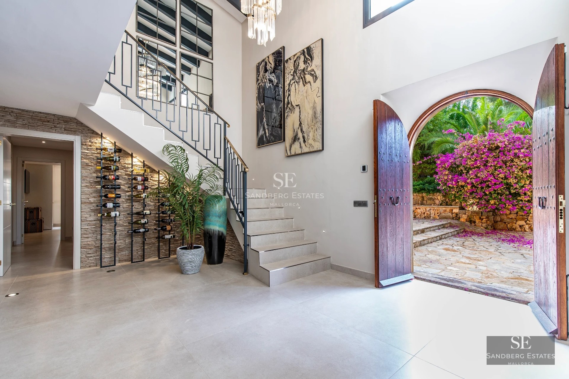 Exterior of modern villa with pool, lush garden and minimalist architecture. White facade with large windows.