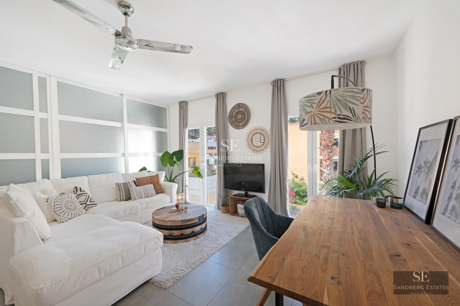 Exterior view of a modern villa featuring an infinity pool, lush garden, and expansive terraces. Sleek and minimalist architectural design.