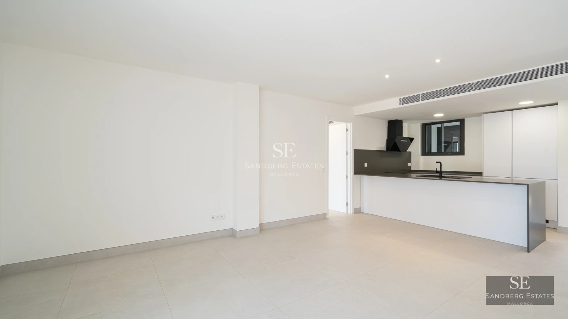 Bright, spacious living room with balcony, sea view. Modern design, neutral color palette, high-quality finishes.