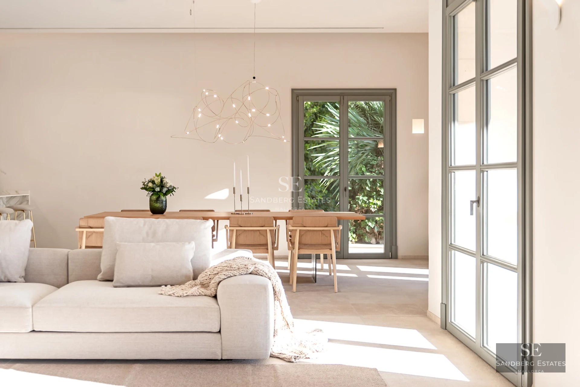 Exterior view of a modern villa with reflecting pool, surrounded by lush greenery. Sleek and contemporary architectural design.