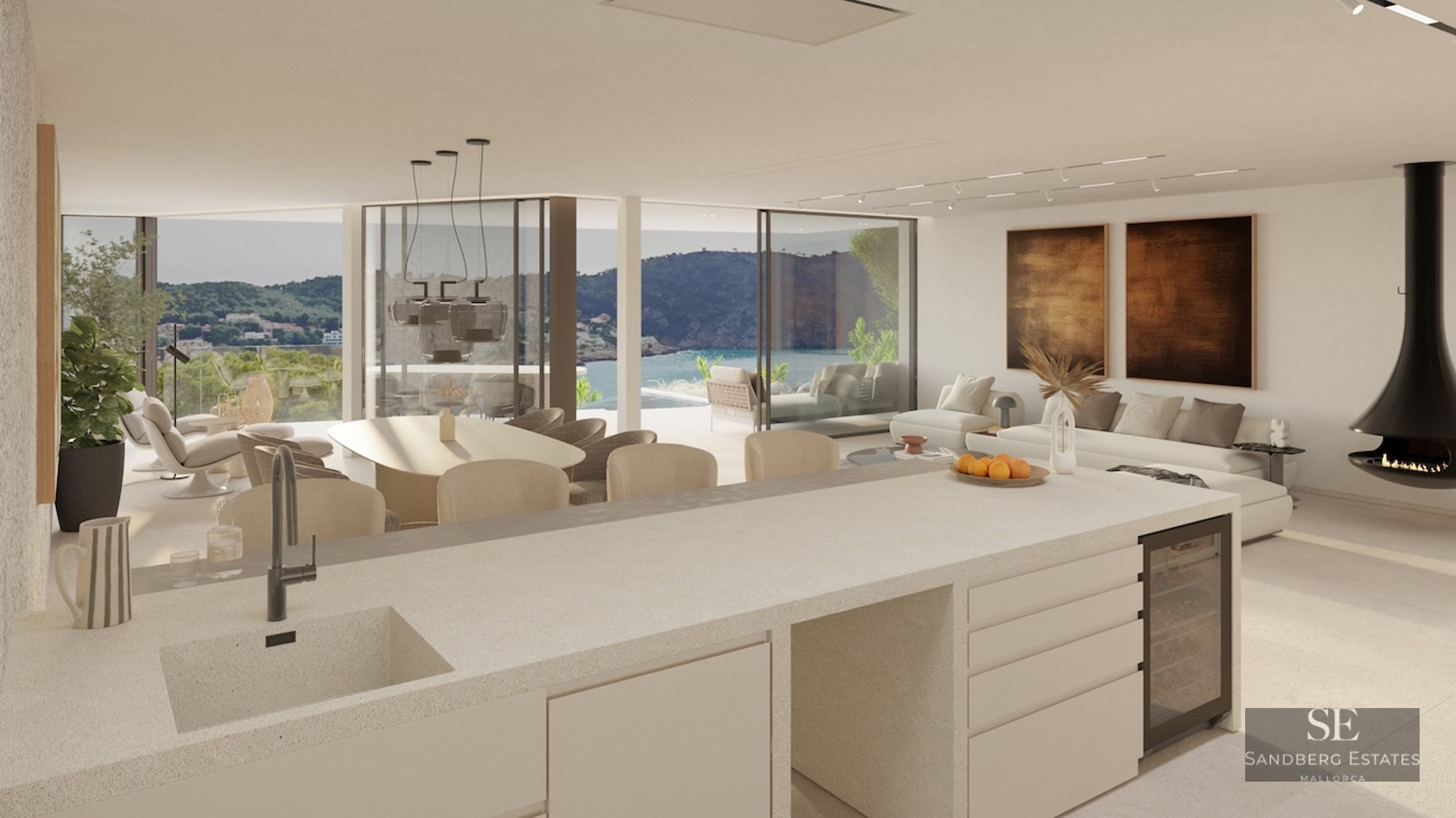 Spacious open-plan living and dining area with kitchen, modern hanging fireplace, and floor-to-ceiling sea views.