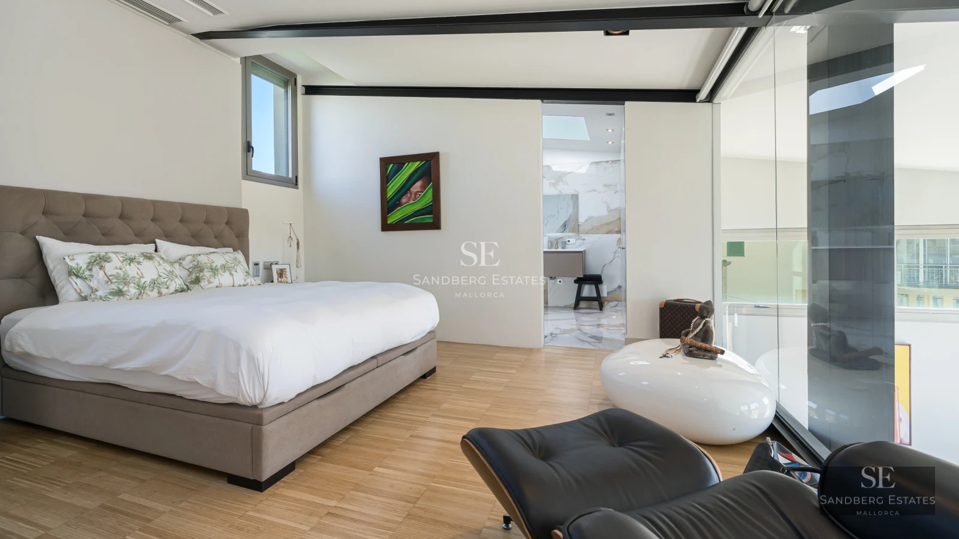 Modern villa featuring an infinity pool, lounge chairs, and lush garden. Minimalist architecture, large windows, and elegant design.