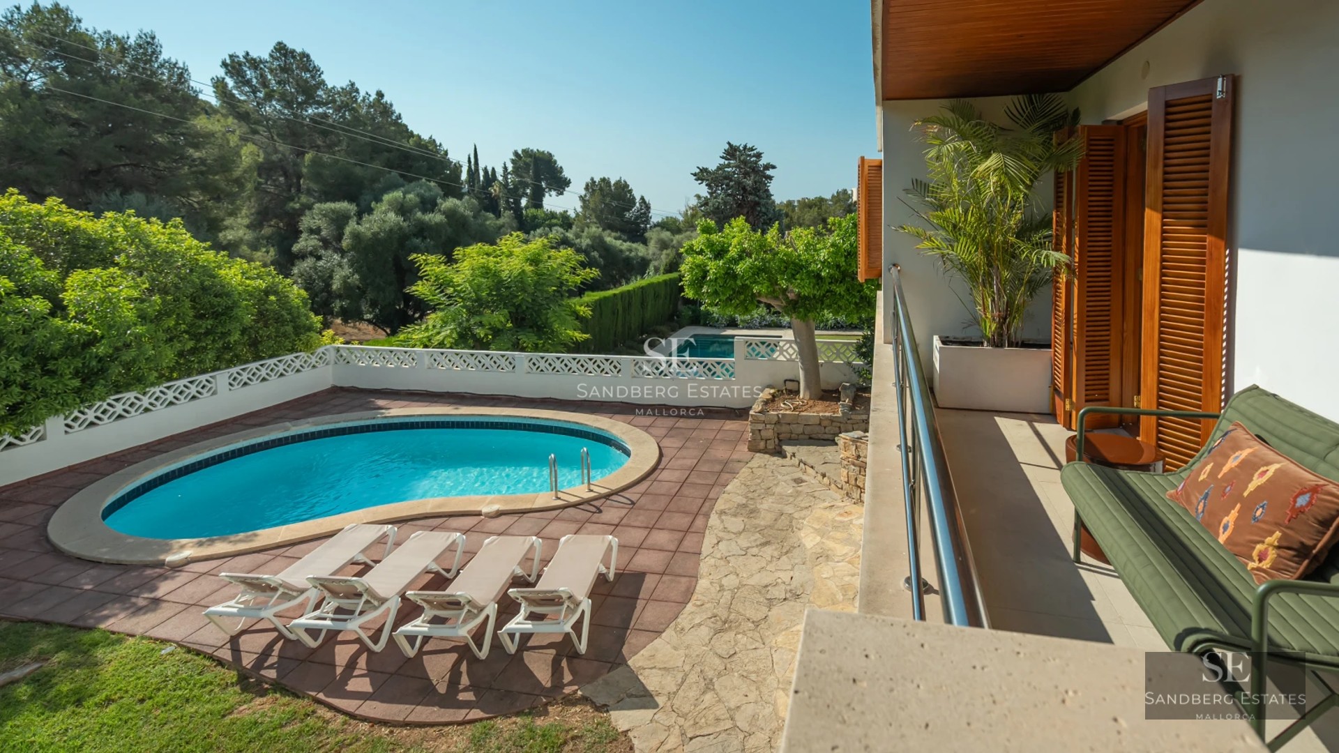 Expansive terrace with pool, sun loungers, and stunning views. Modern design, natural lighting, and luxurious details.