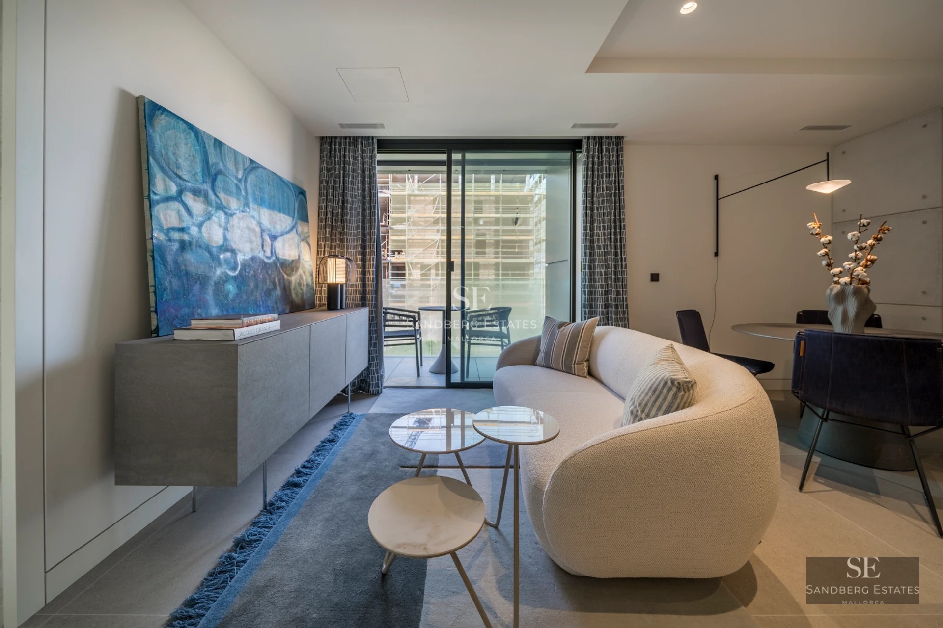 Exterior of a modern villa featuring a pool, terraces, and large windows. Sleek design with clean lines and lush landscaping.