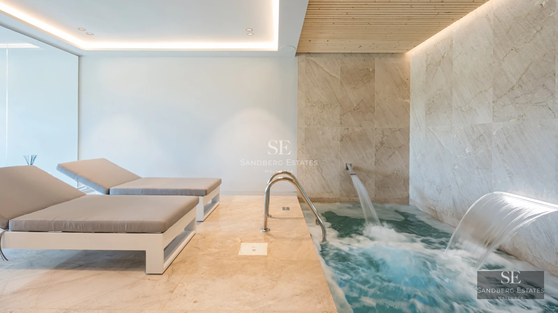 Exterior of a modern villa with pool, sun loungers, and lush vegetation. Minimalist design, high-end materials and abundant natural light.