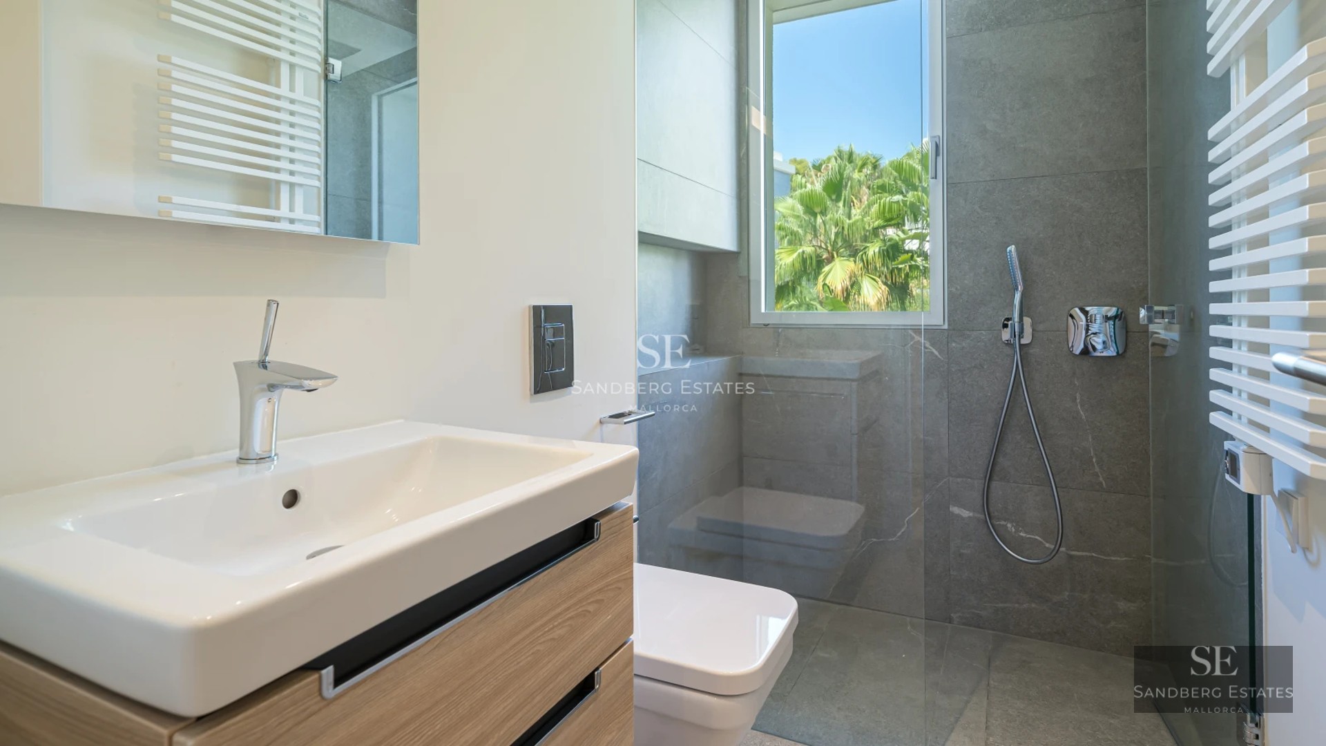 Spacious balcony with pool and breathtaking views. Modern design, glass railing and wooden floor. Luxury and comfort.