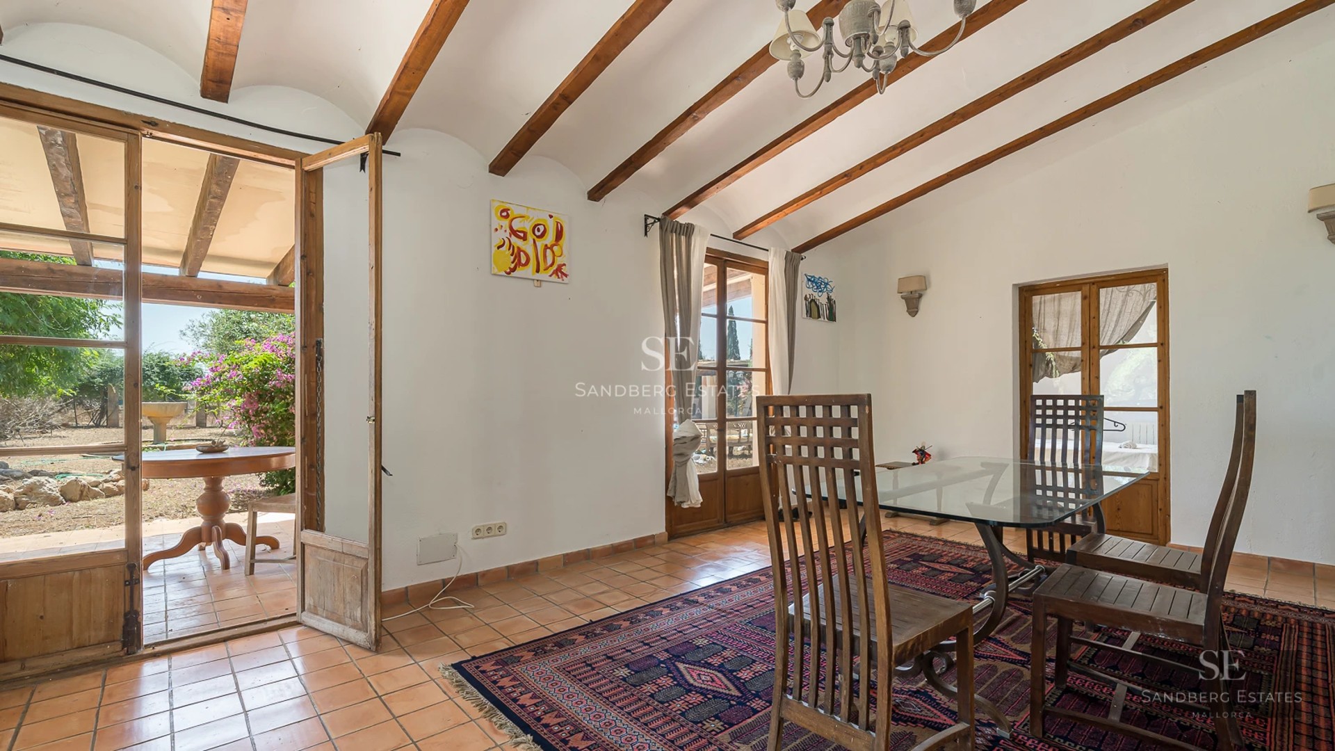 Spacious terrace with panoramic sea views. Modern and elegant outdoor furniture. Private pool and lush greenery.