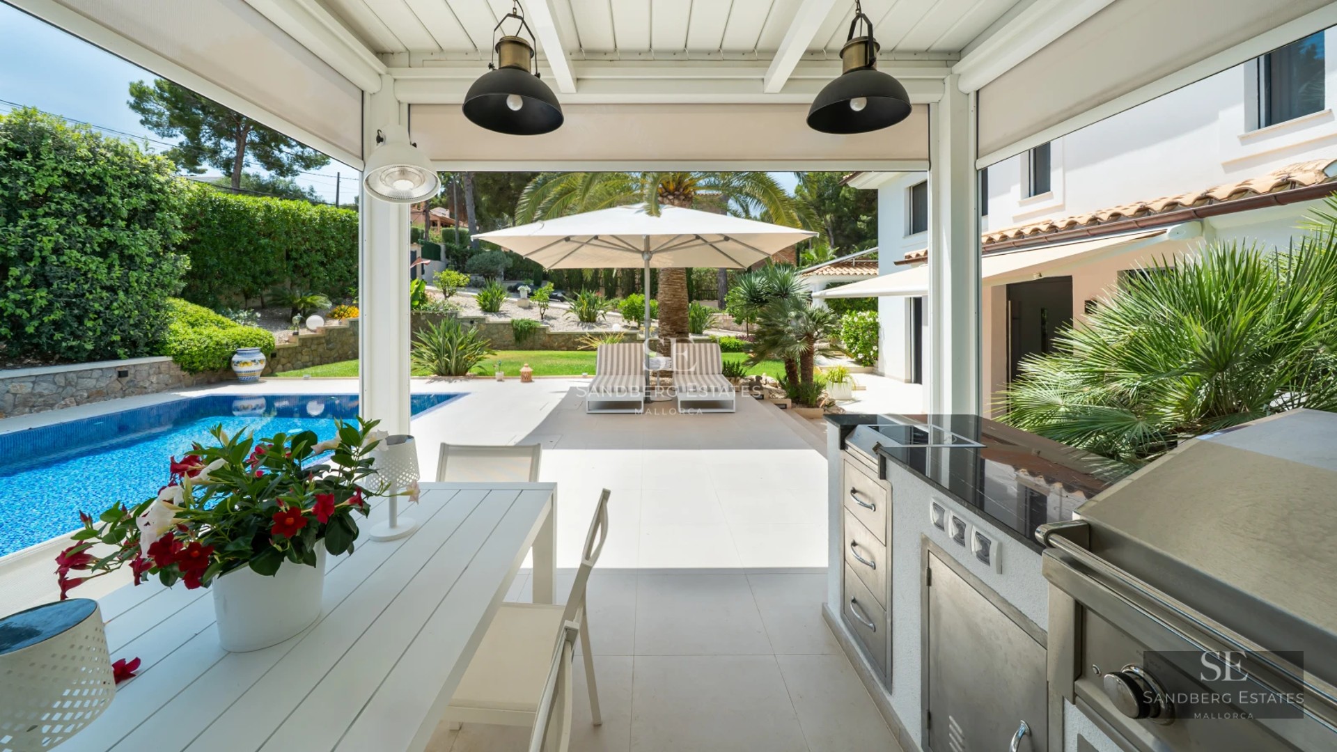 Exterior view of a modern house with a pool. Minimalist design, large windows, and manicured gardens.