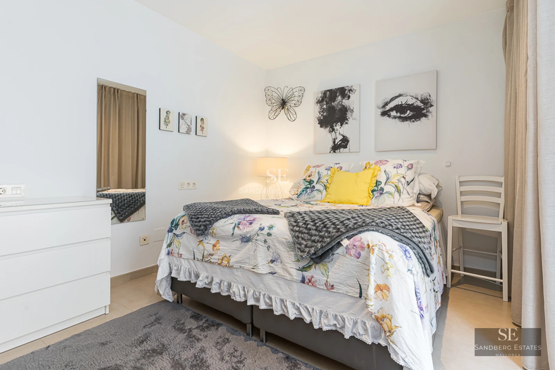 Spacious terrace with infinity pool and sea views. Modern design with stylish outdoor furniture. Warm ambient lighting.