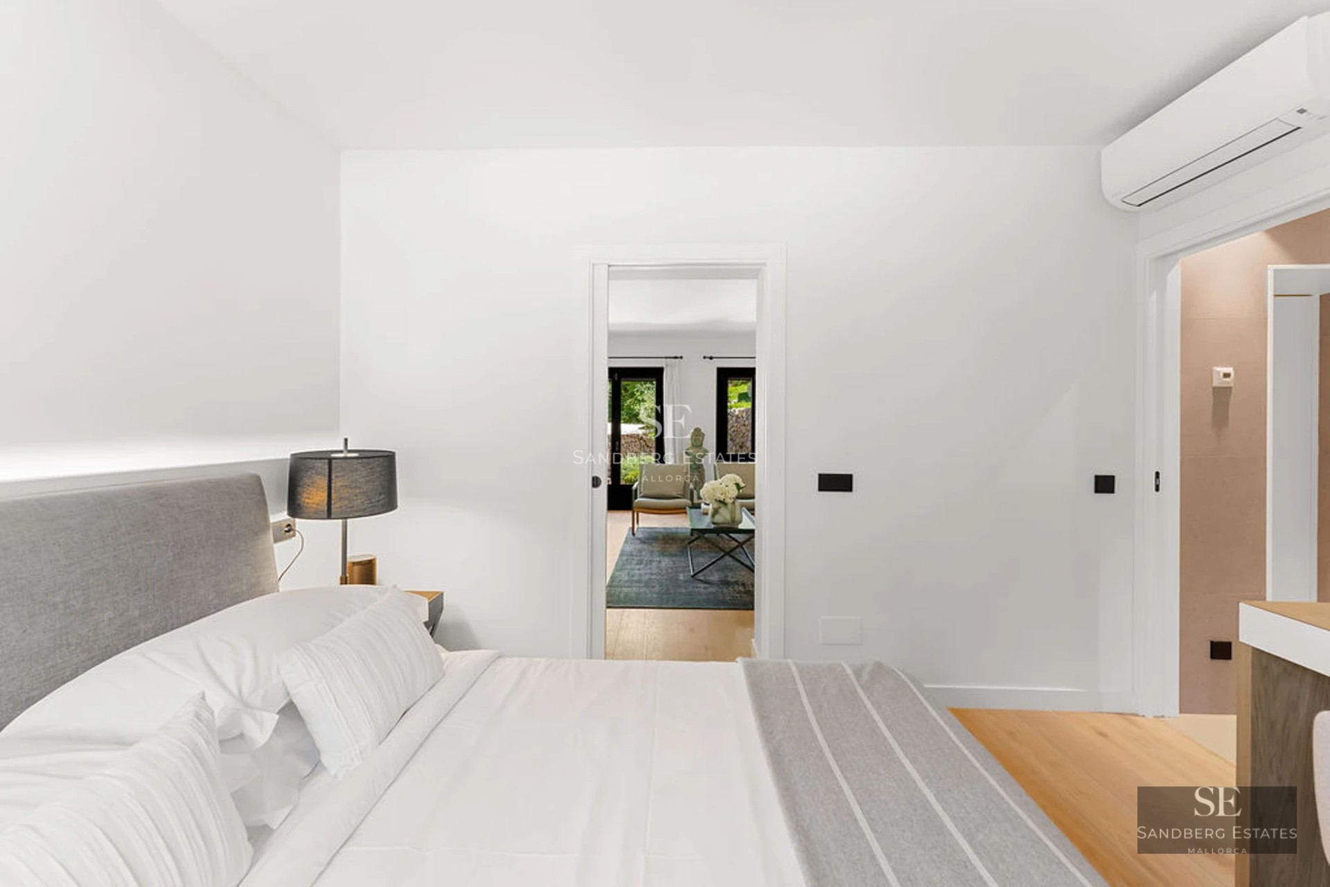 Image of a villa featuring a modern and elegant design pool. Bright interior with large windows. Lush garden and swimming pool.