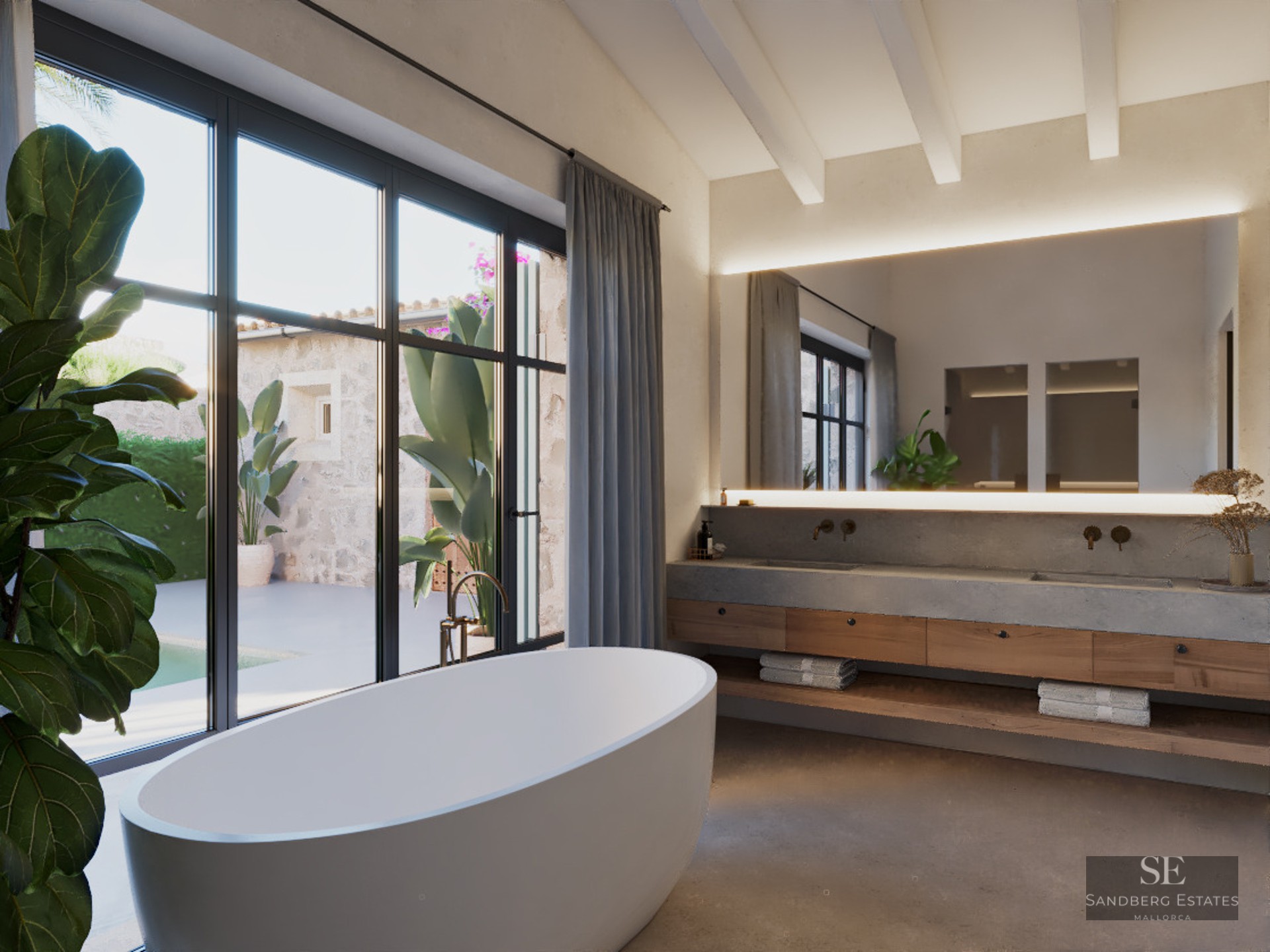 A minimalist master bathroom featuring a freestanding tub, wood and concrete vanity, and large windows facing a courtyard.
