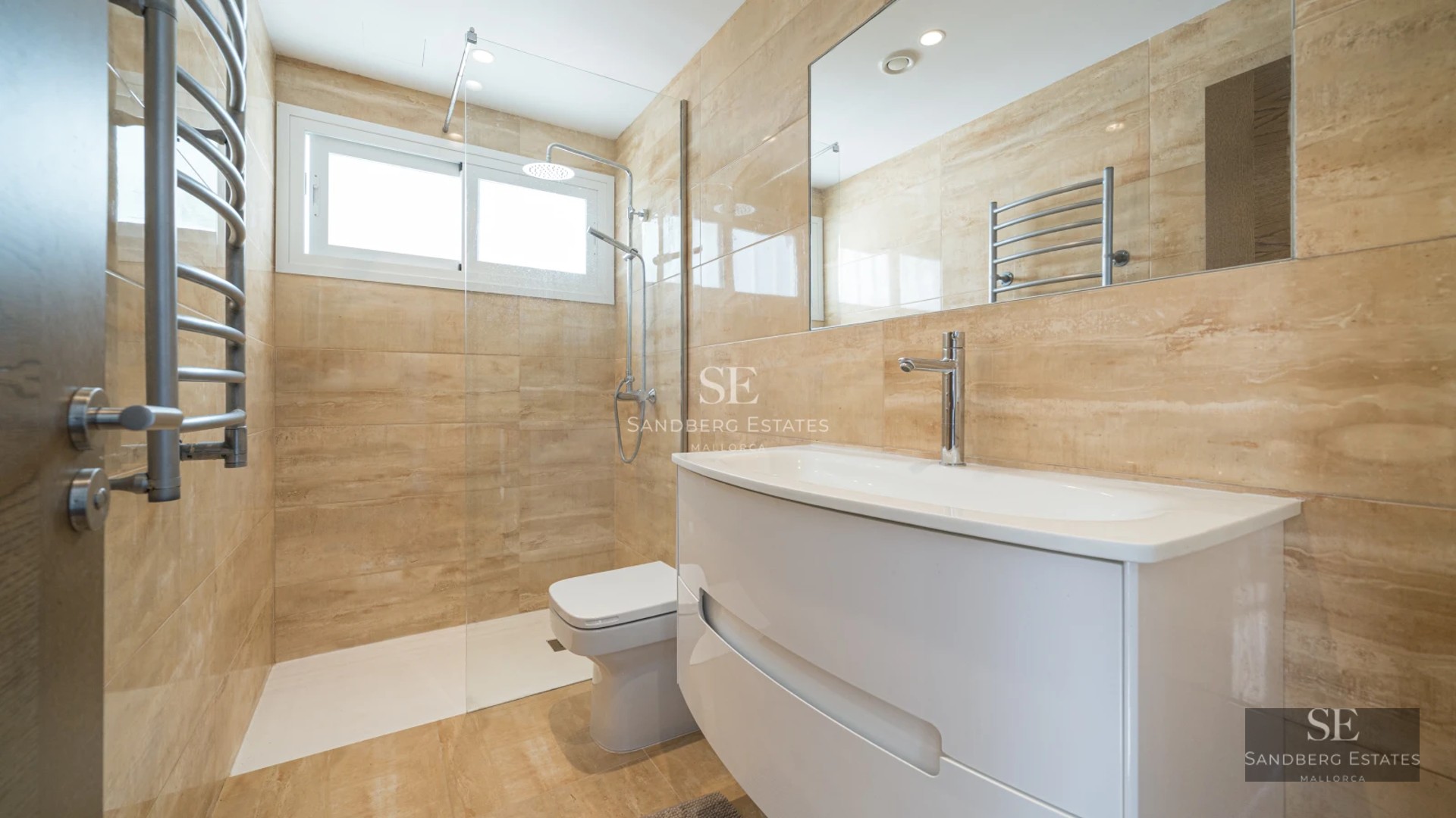 Modern penthouse with glazed balcony, light wood flooring and sea view. Minimalist design, plenty of natural light.