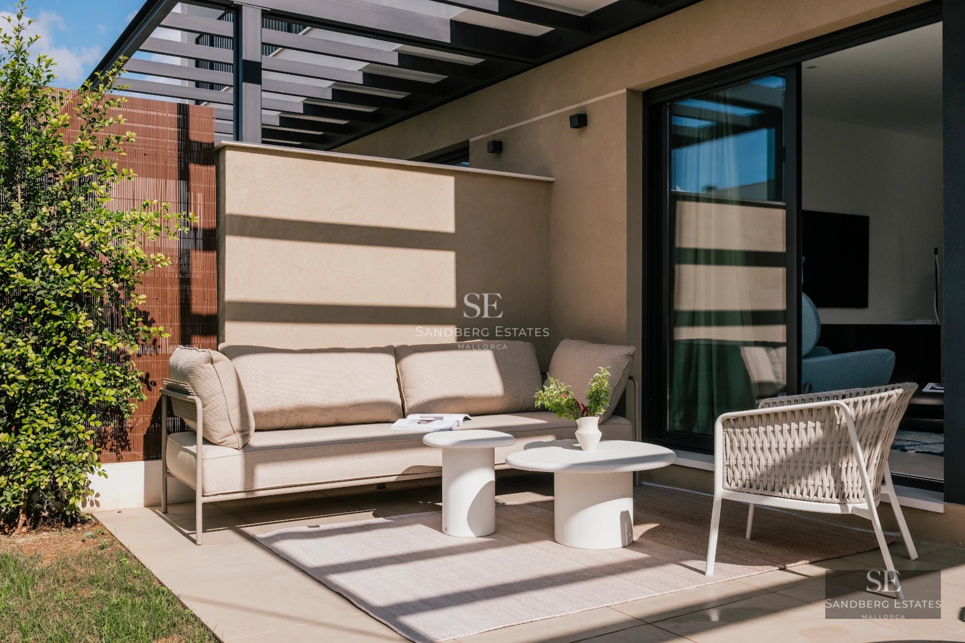 Spacious terrace with infinity pool, sun loungers, and panoramic views. Modern design with ambient lighting and lush vegetation.