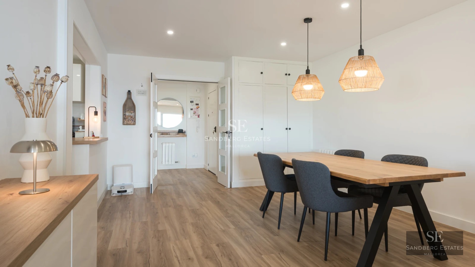 View of infinity pool, lush garden, and modern villa facade. Minimalist architecture, luxury finishes. Natural lighting.