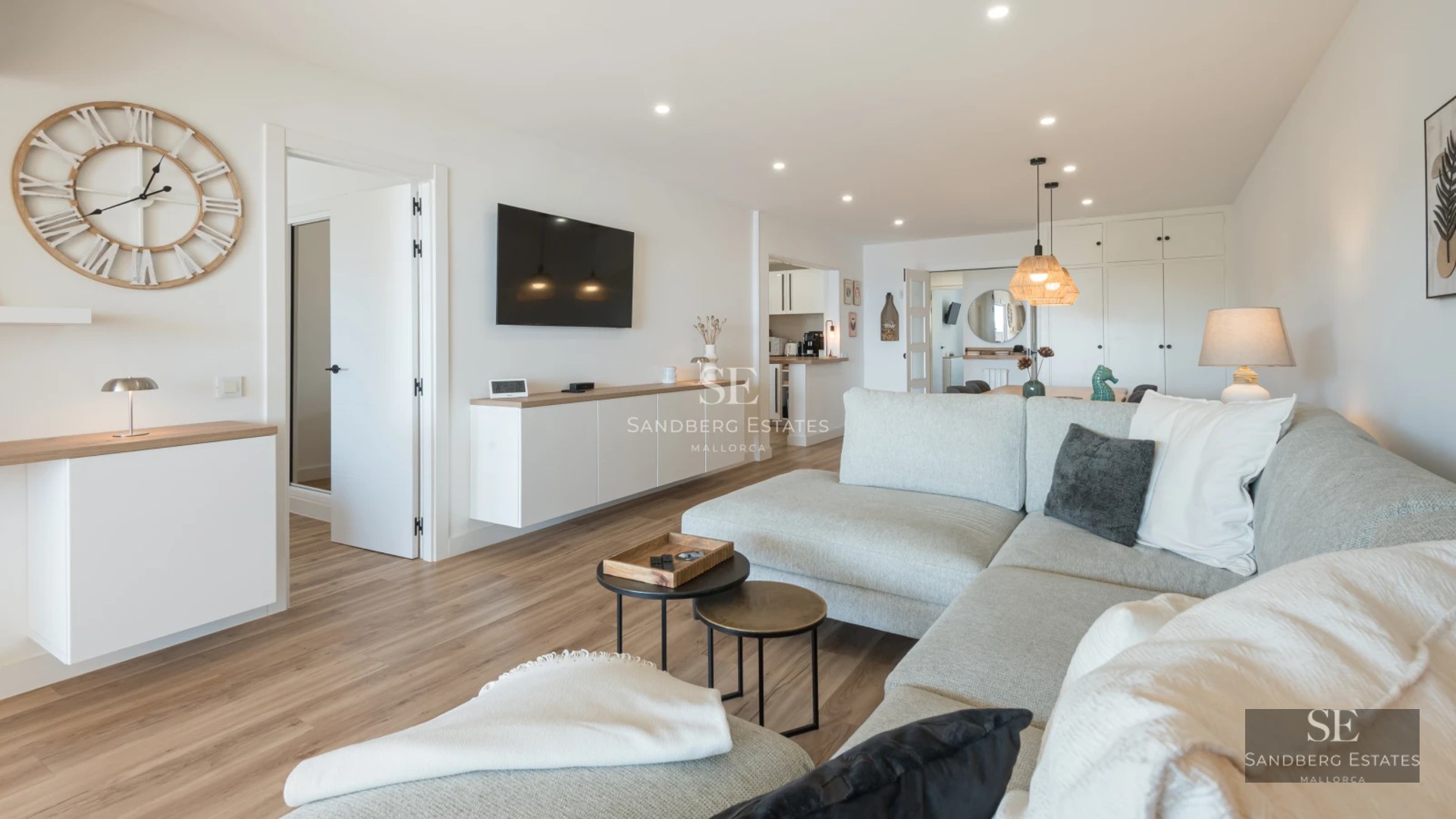 Expansive terrace with pool, sun loungers, and panoramic views. Modern design with ambient lighting.