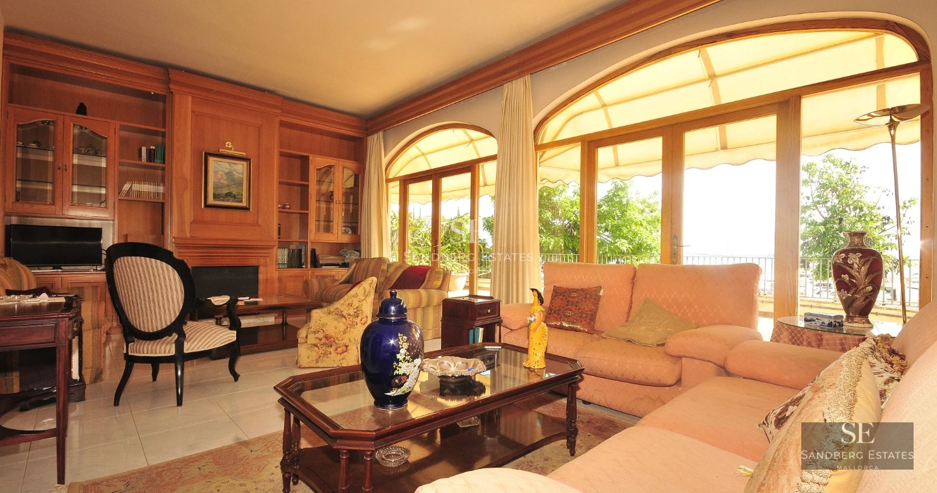 Exterior of a modern villa with pool, palm trees, and large windows. Minimalist and elegant design. Natural lighting.