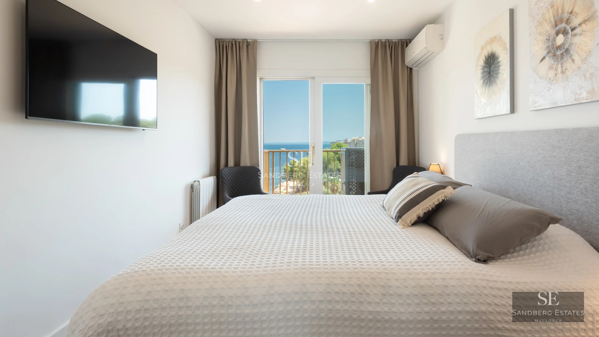 Exterior view of a modern villa featuring a pool and lush gardens. Architectural design with clean lines and large windows.