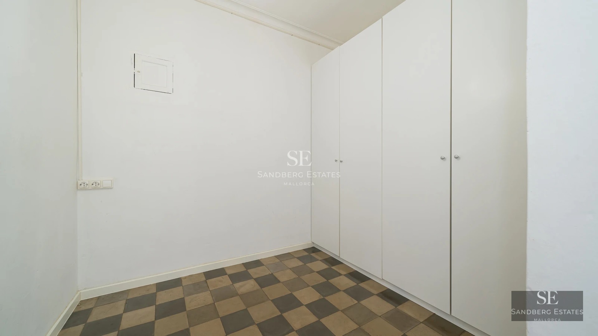 Exterior view of a modern villa with a pool, large windows, manicured garden, and minimalist design. Natural lighting.