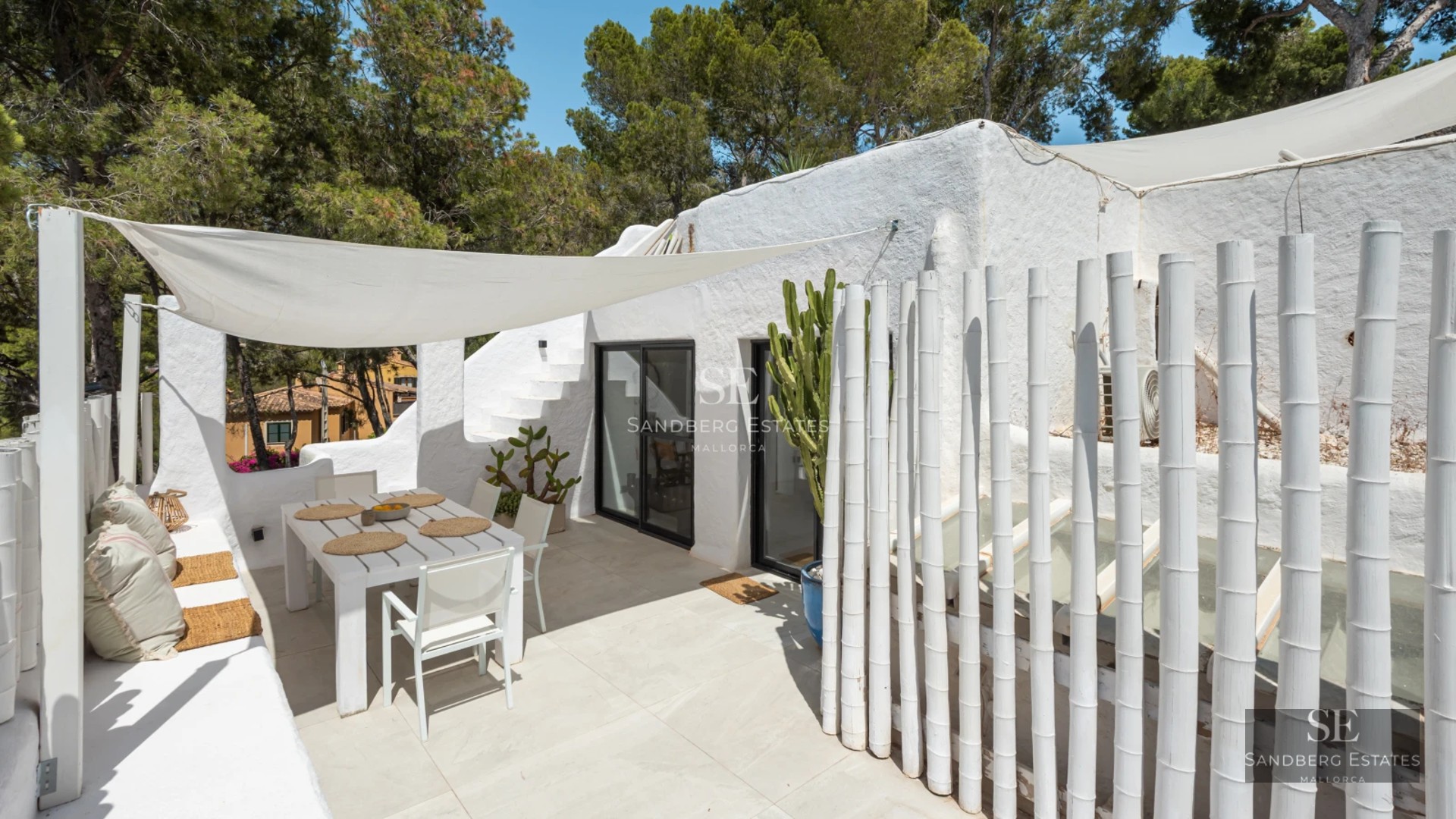 Spacious terrace with infinity pool and panoramic views. Modern design, natural lighting, and elegant outdoor furniture.