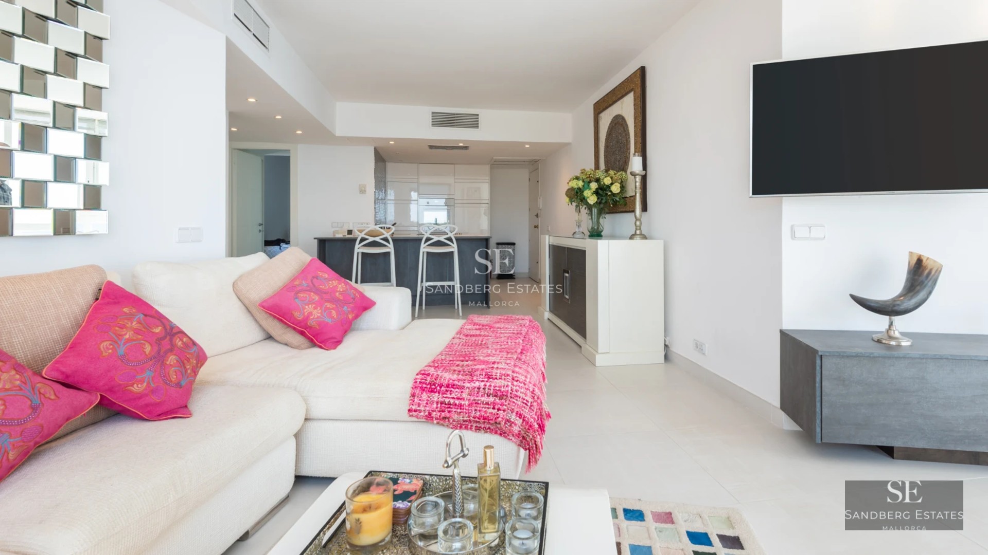 Exterior view of a modern villa with reflective pool, large windows, elegant landscaping, and minimalist architectural design.