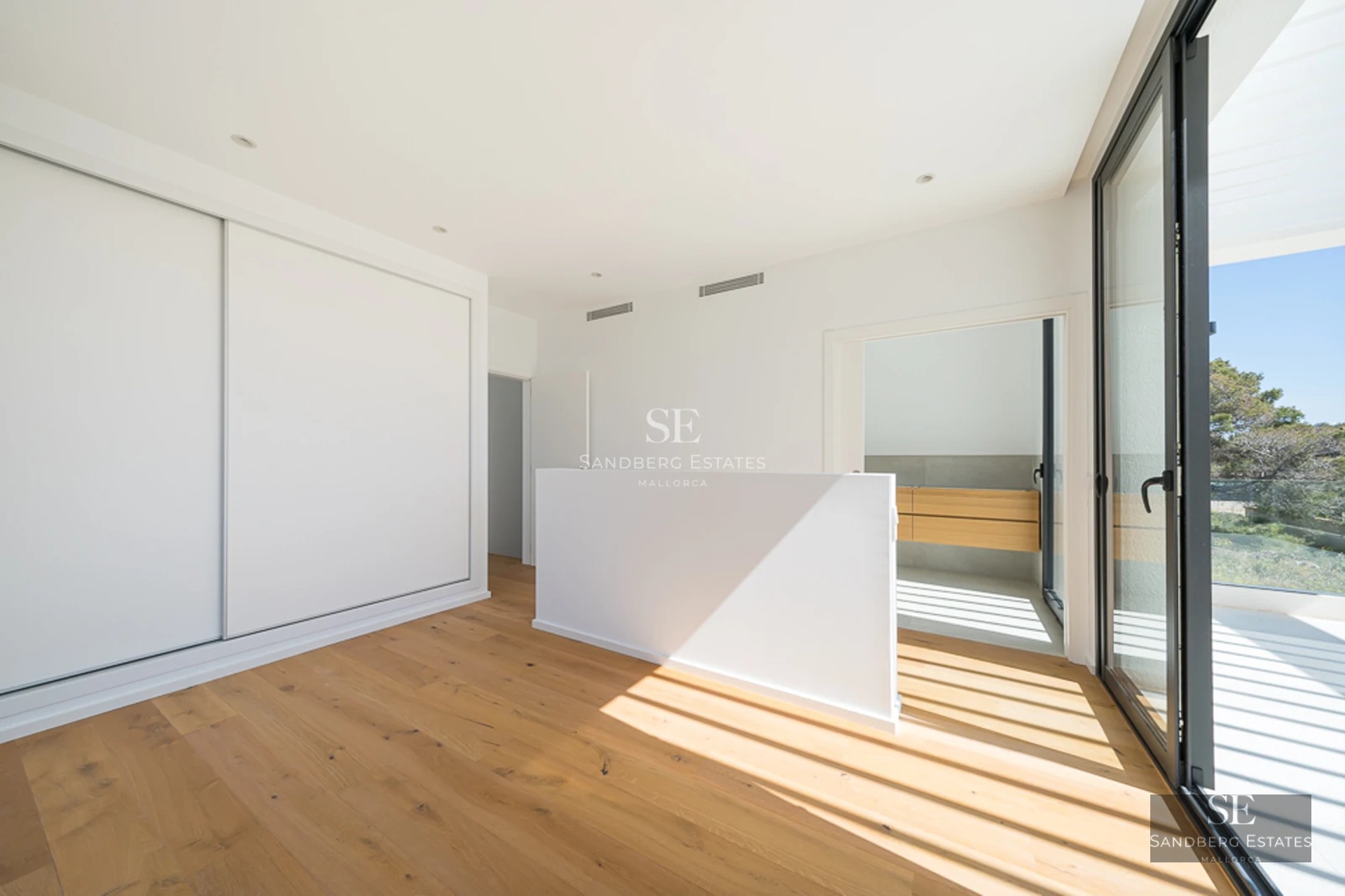 Exterior view of a modern house with a pool, surrounded by lush greenery and minimalist architecture.