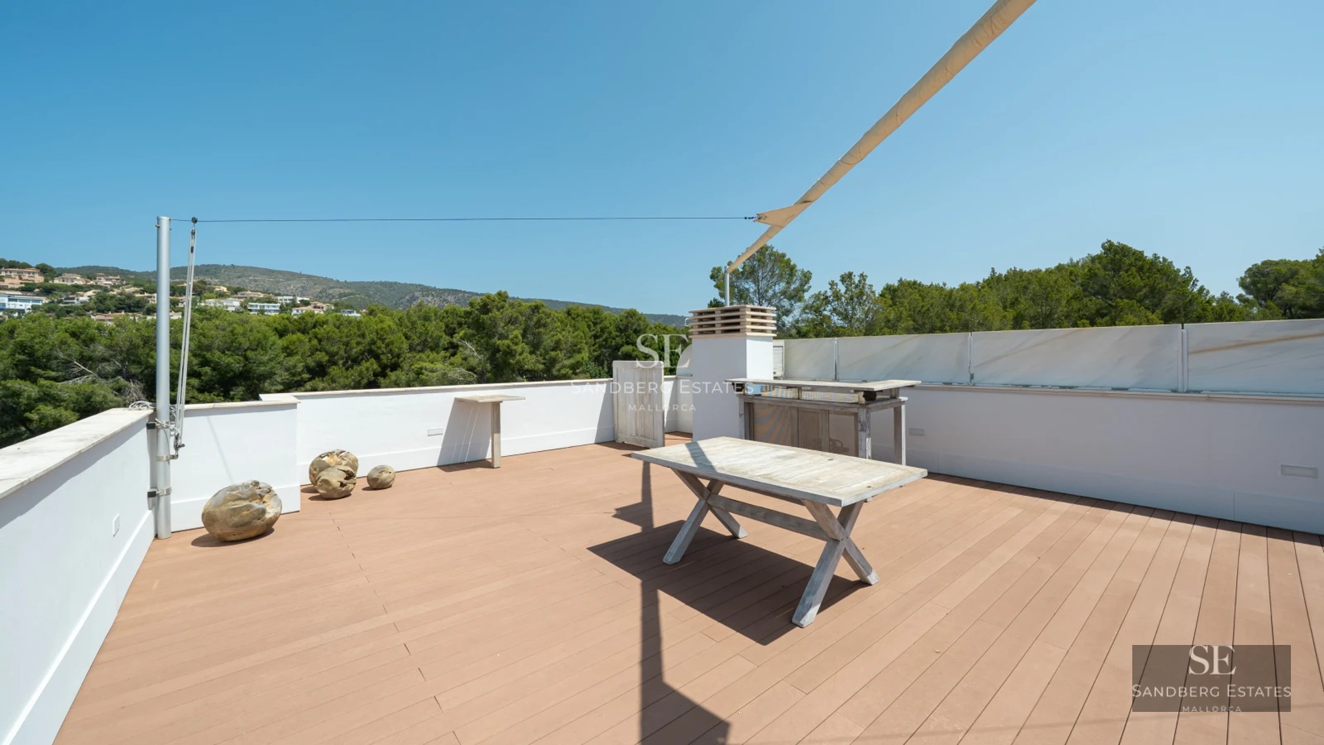 Modern villa featuring a minimalist facade, large windows, a pool, and a lush garden. Warm ambient lighting.