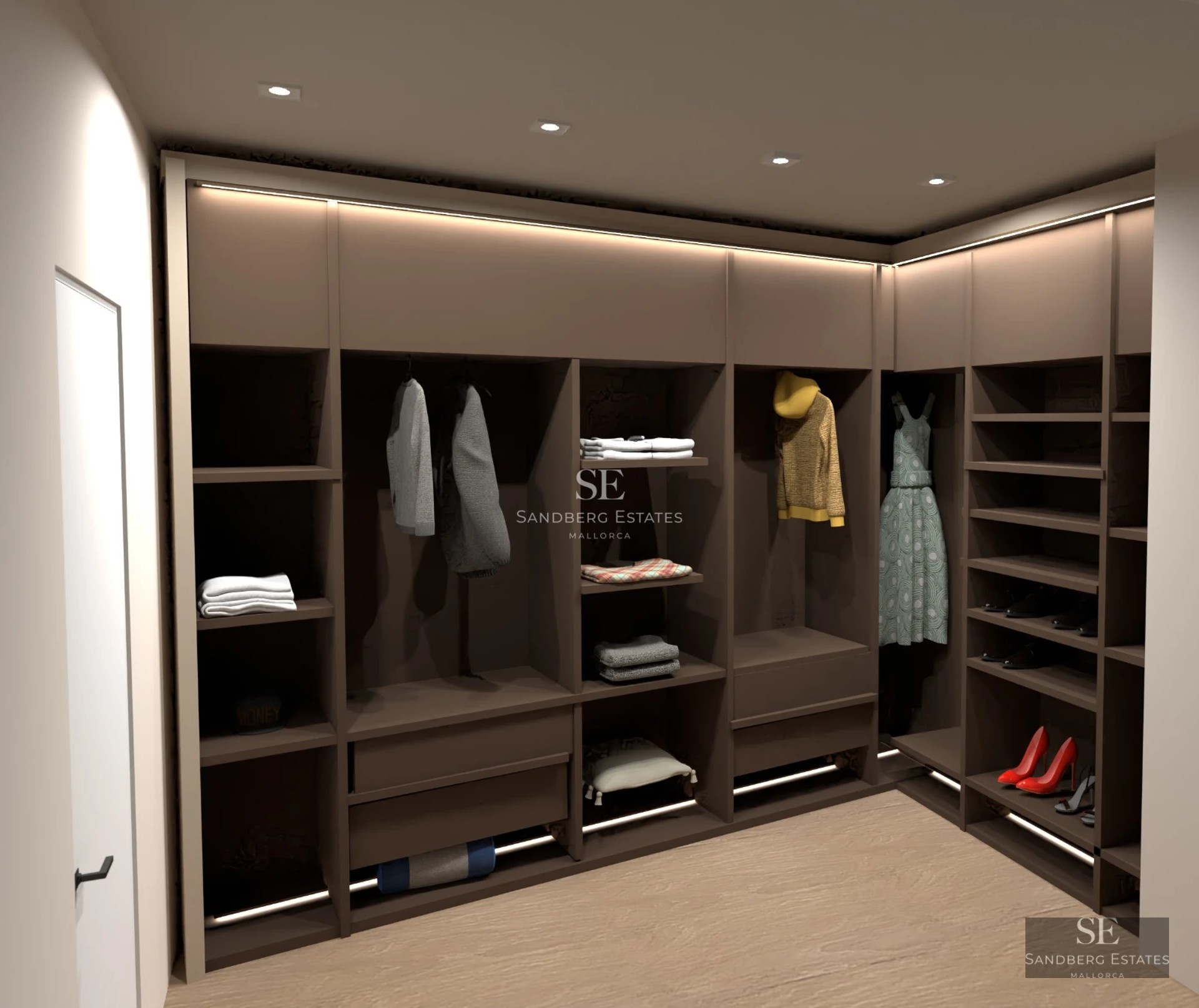 Spacious living room with panoramic sea views. Modern design, gray sofas, glass coffee table, and light wood flooring.