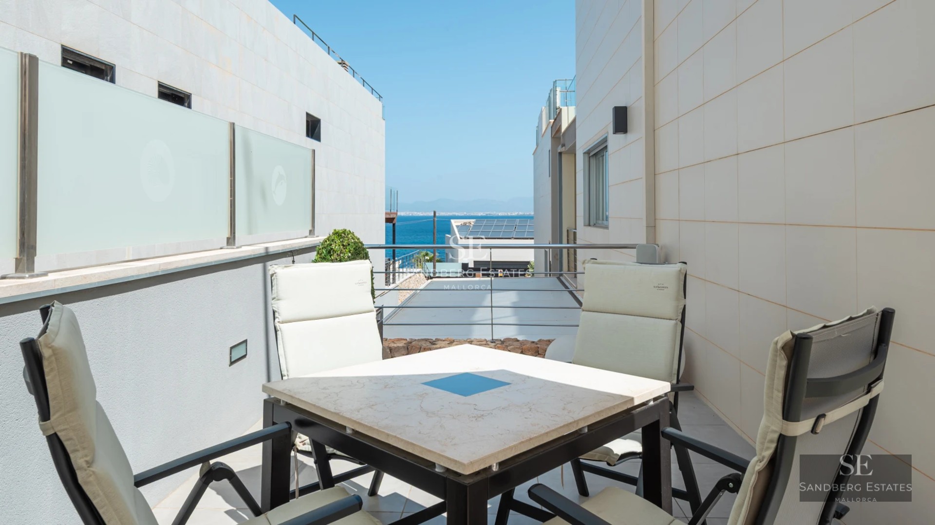 Exterior view of modern villa with infinity pool, expansive terraces, and minimalist design. Luxurious residence with gardens and panoramic views.