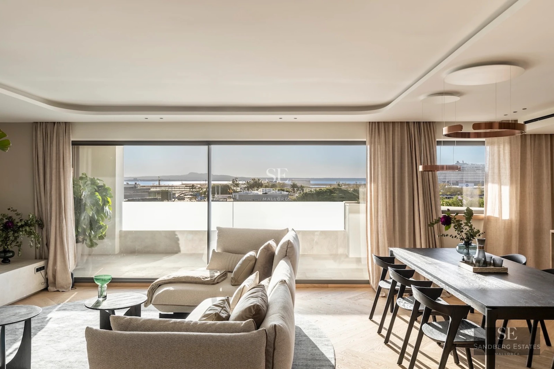 View of an infinity pool with modern design. Lush garden and minimalist architecture. Ideal for relaxation and luxury enjoyment.