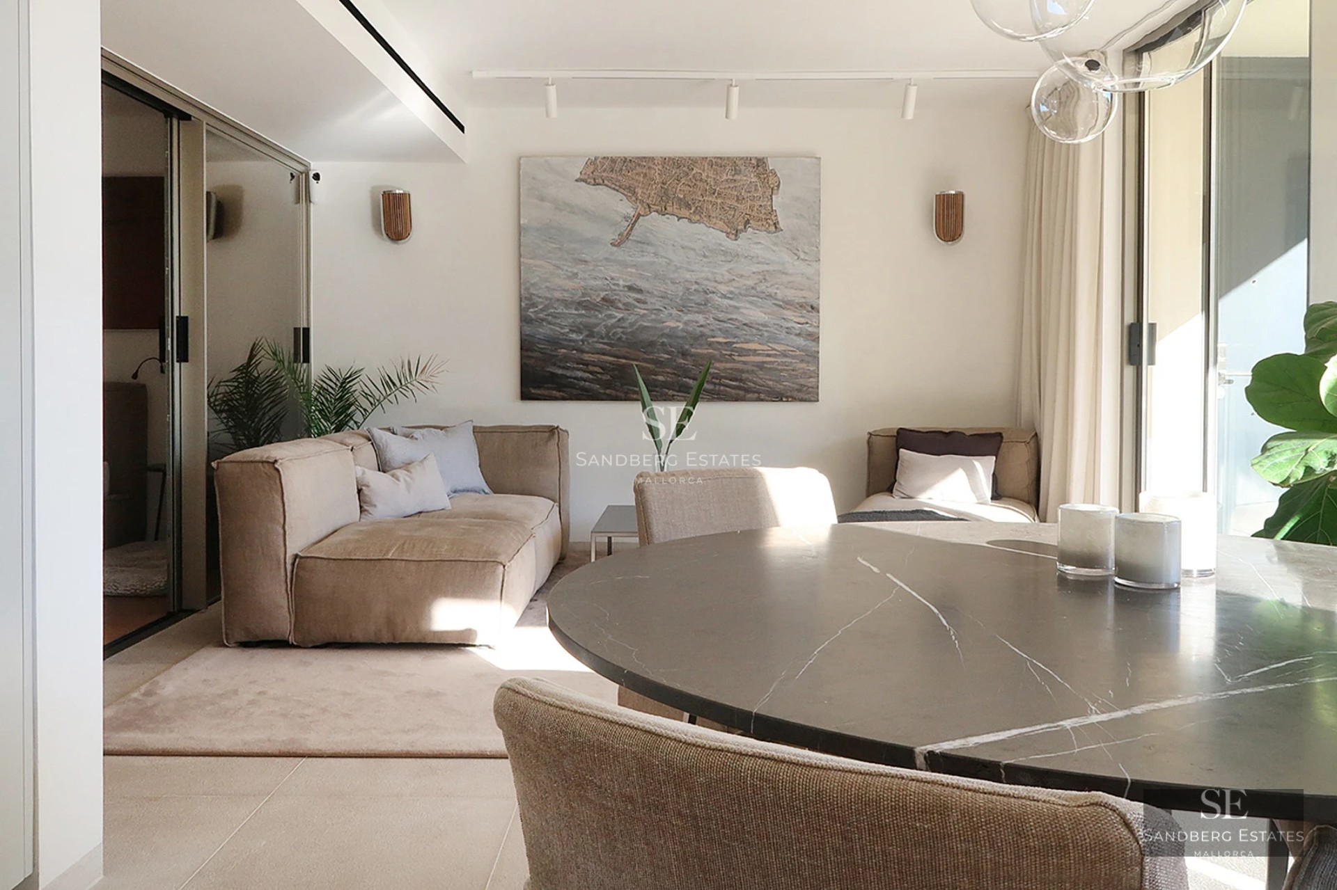 Spacious terrace with infinity pool and ocean views. Modern design, stylish outdoor furniture, and minimalist architecture.