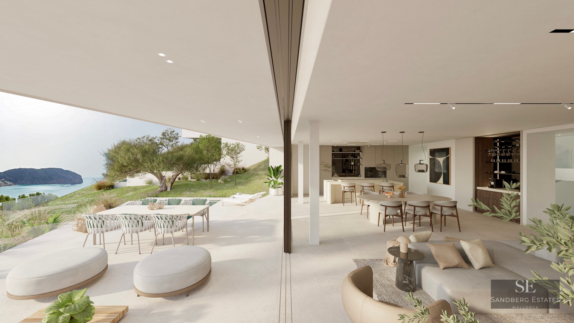 Bright, open-plan living and dining room merging with a spacious terrace overlooking the sea and coastline.